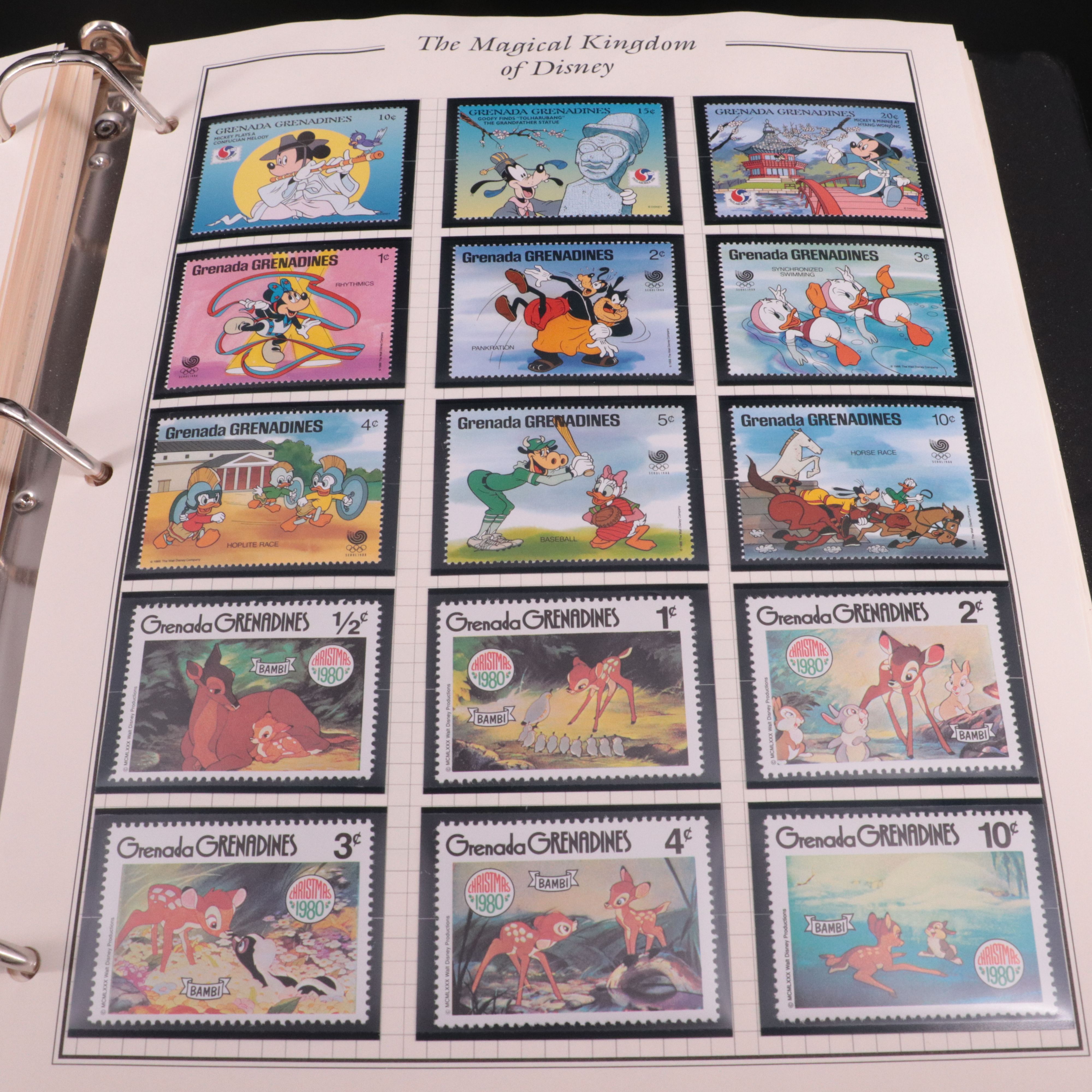 Album of Mint Condition Disney-Themed Postage Stamps