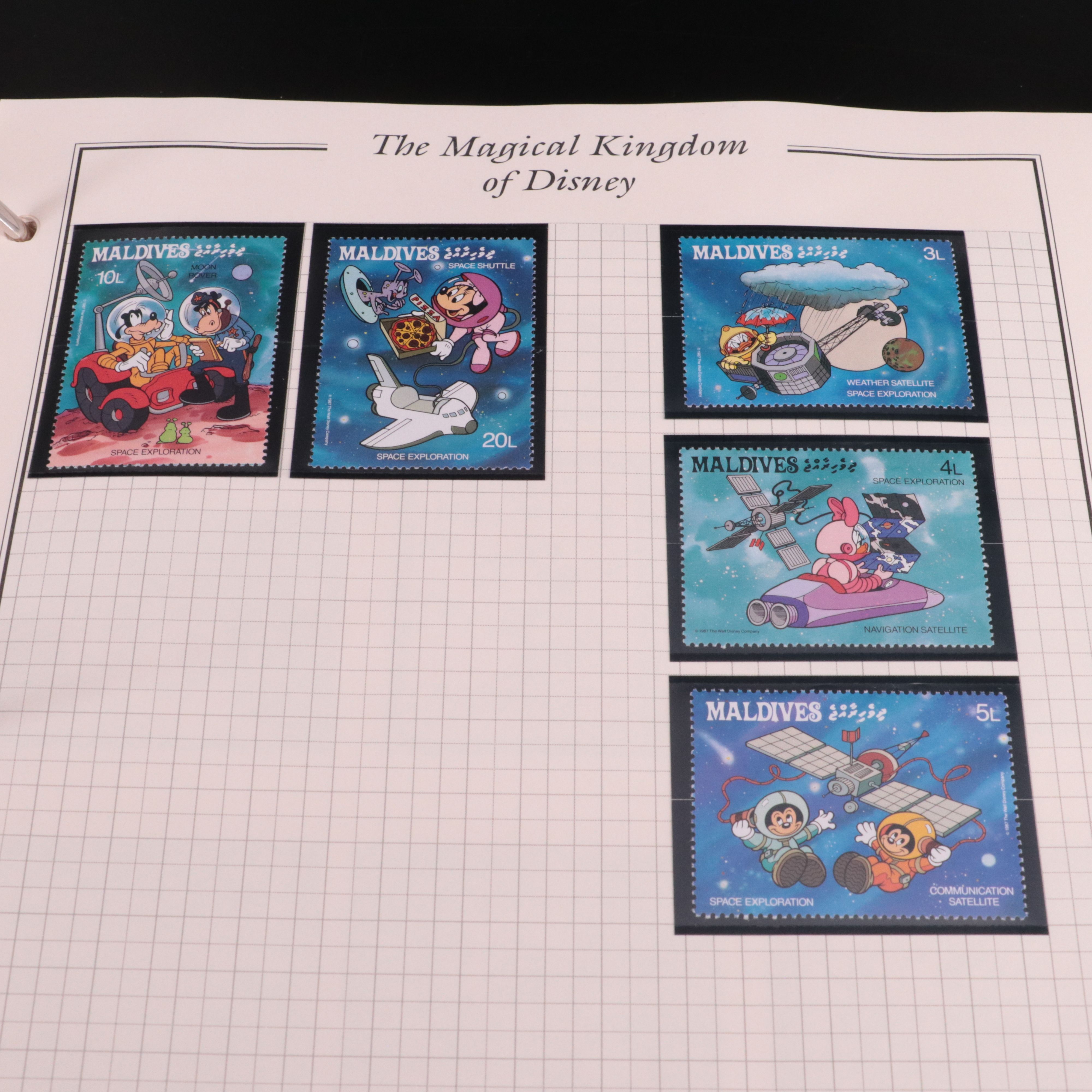 Album of Mint Condition Disney-Themed Postage Stamps