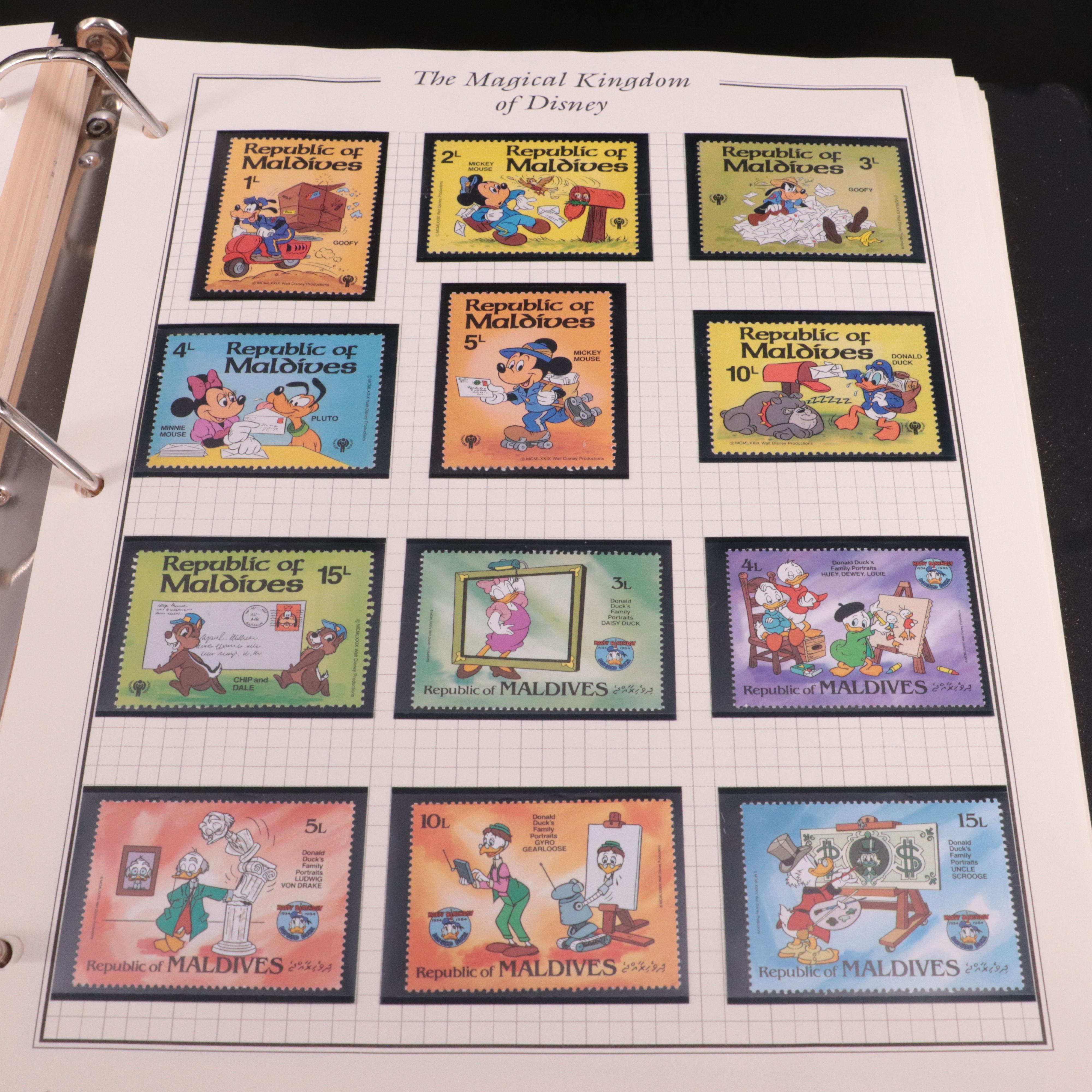 Album of Mint Condition Disney-Themed Postage Stamps