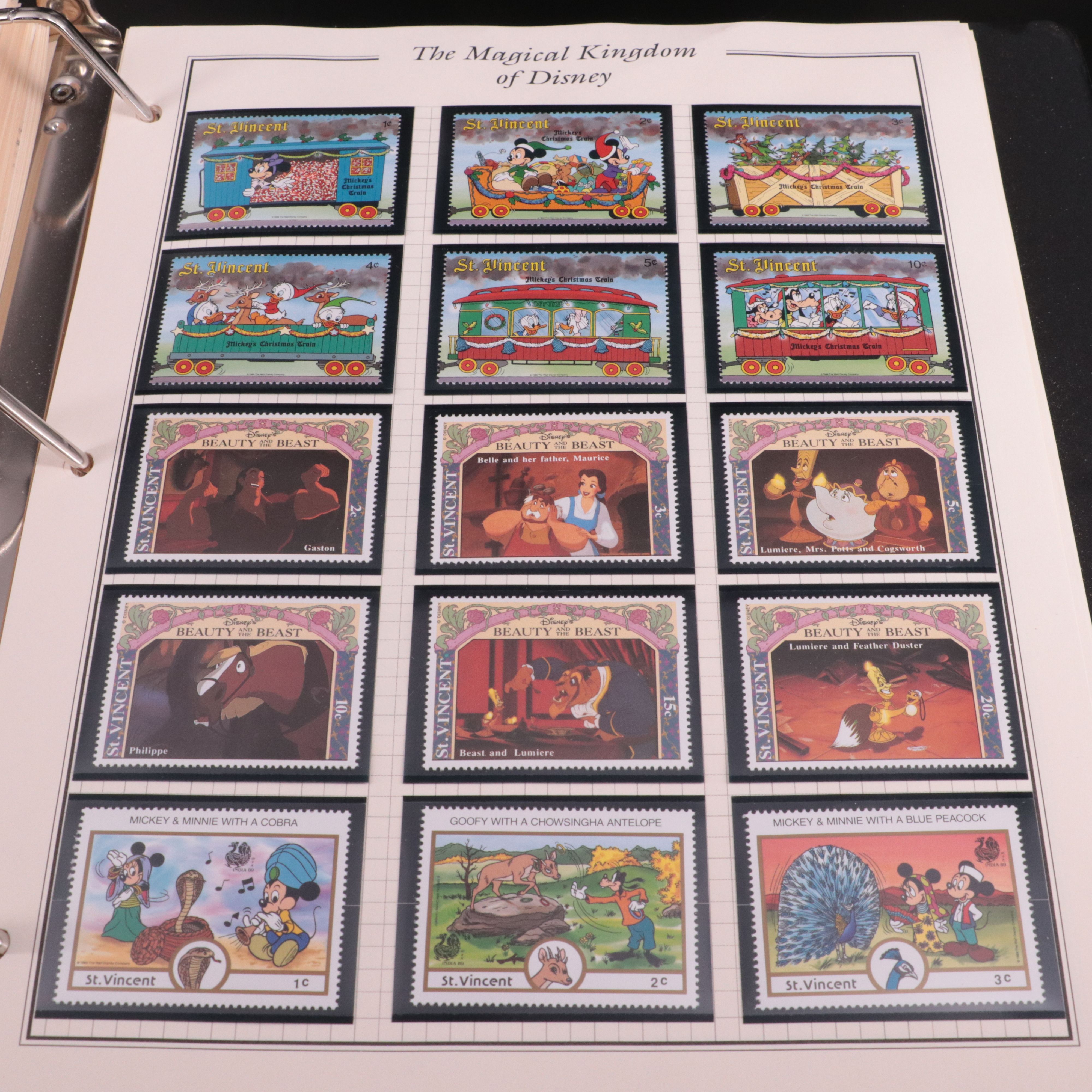 Album of Mint Condition Disney-Themed Postage Stamps