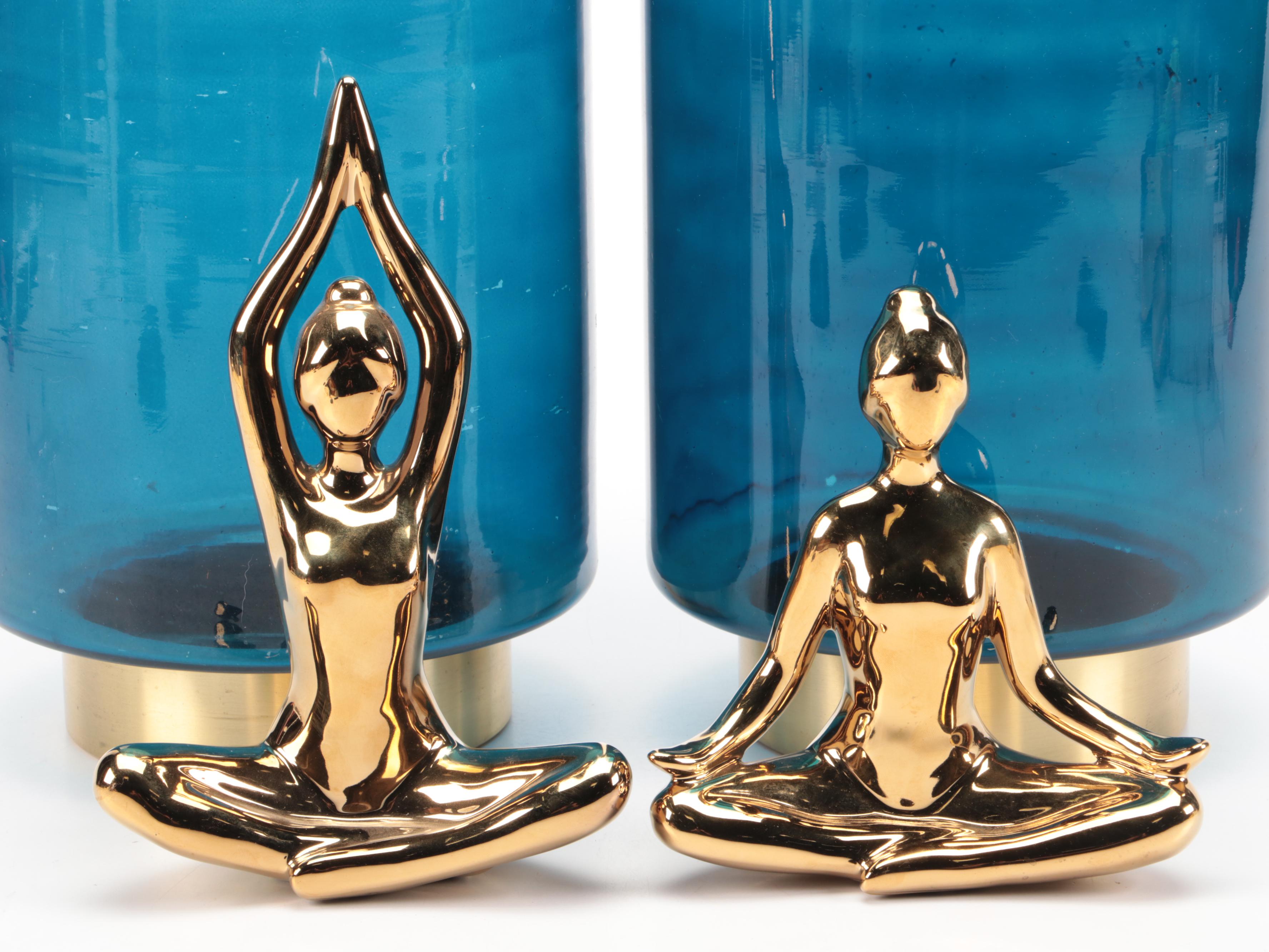 Metallic Base Blue Glass Pillar Candle Holders with Gold Finish Yoga Figures