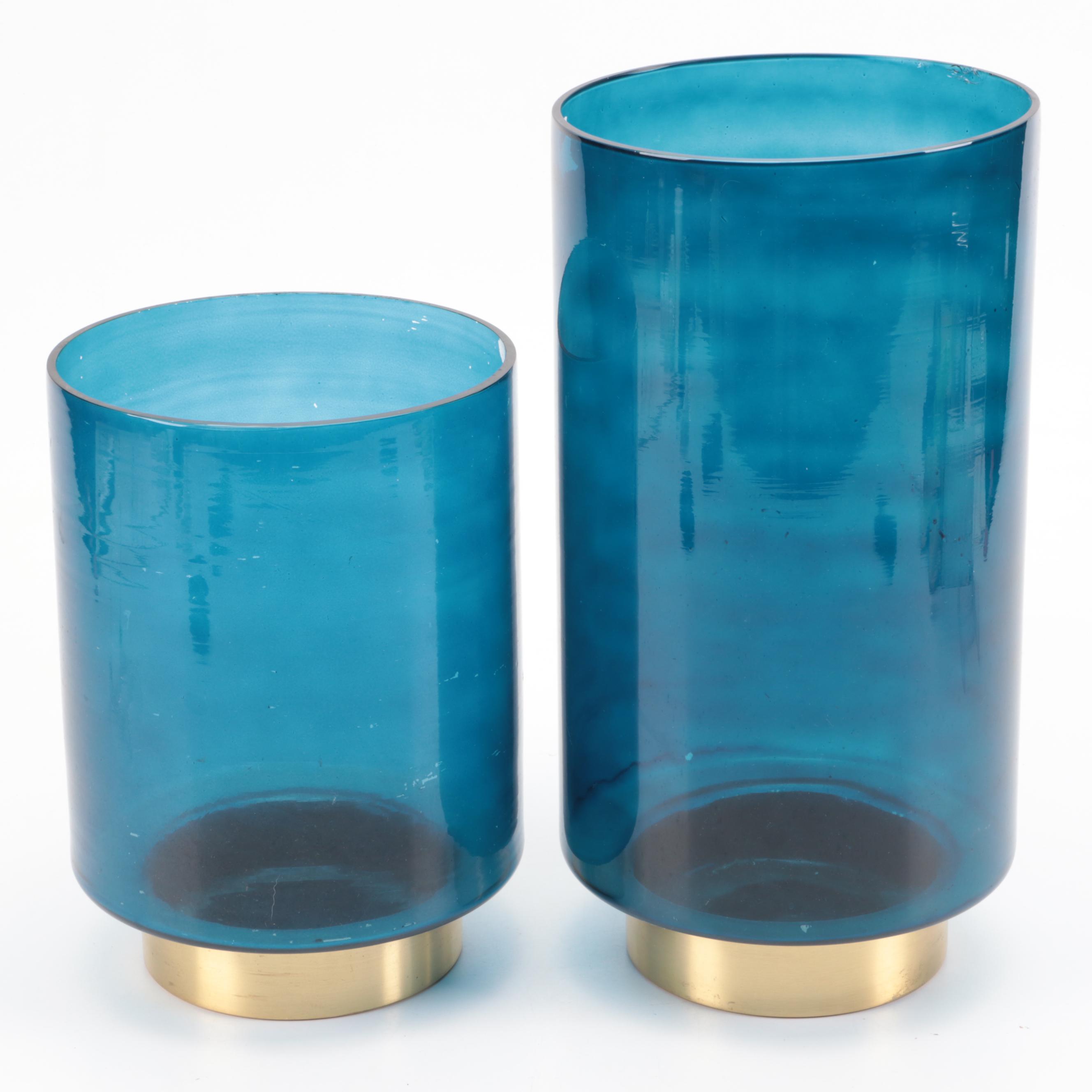 Metallic Base Blue Glass Pillar Candle Holders with Gold Finish Yoga Figures