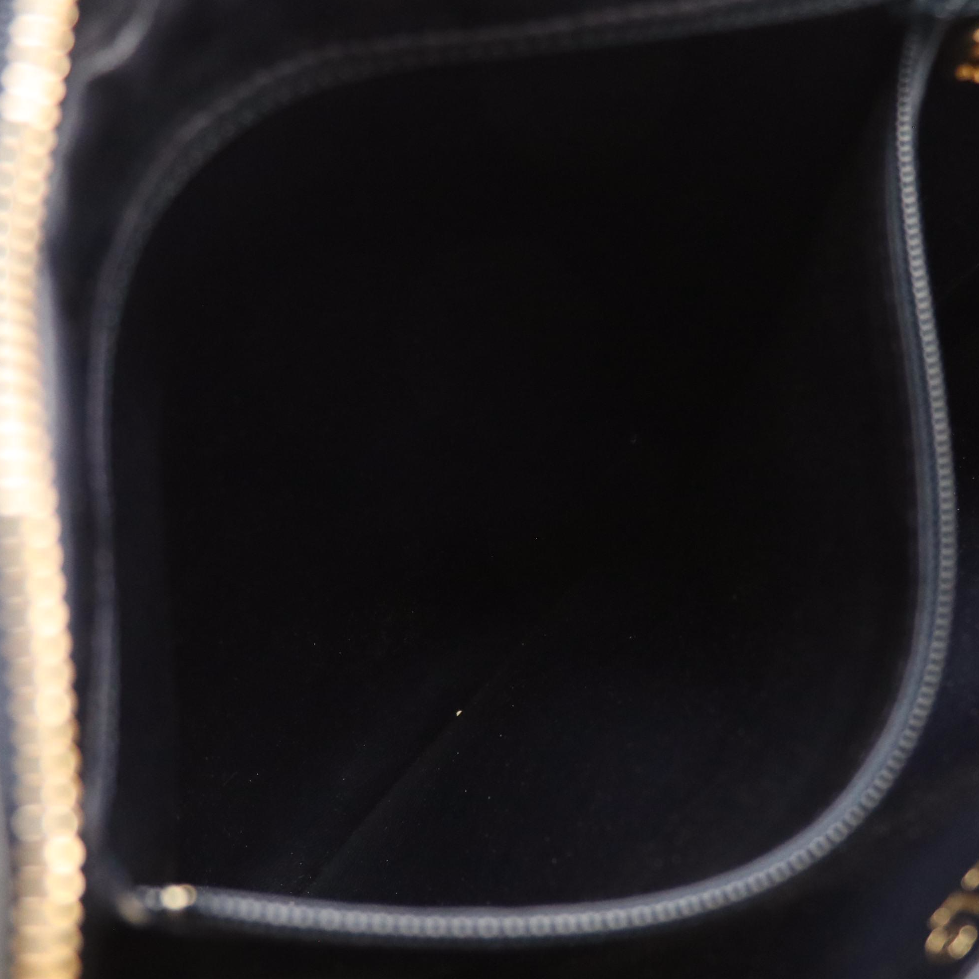 Chanel Zippered Shoulder Bag in Chevron Stitched Lambskin Leather