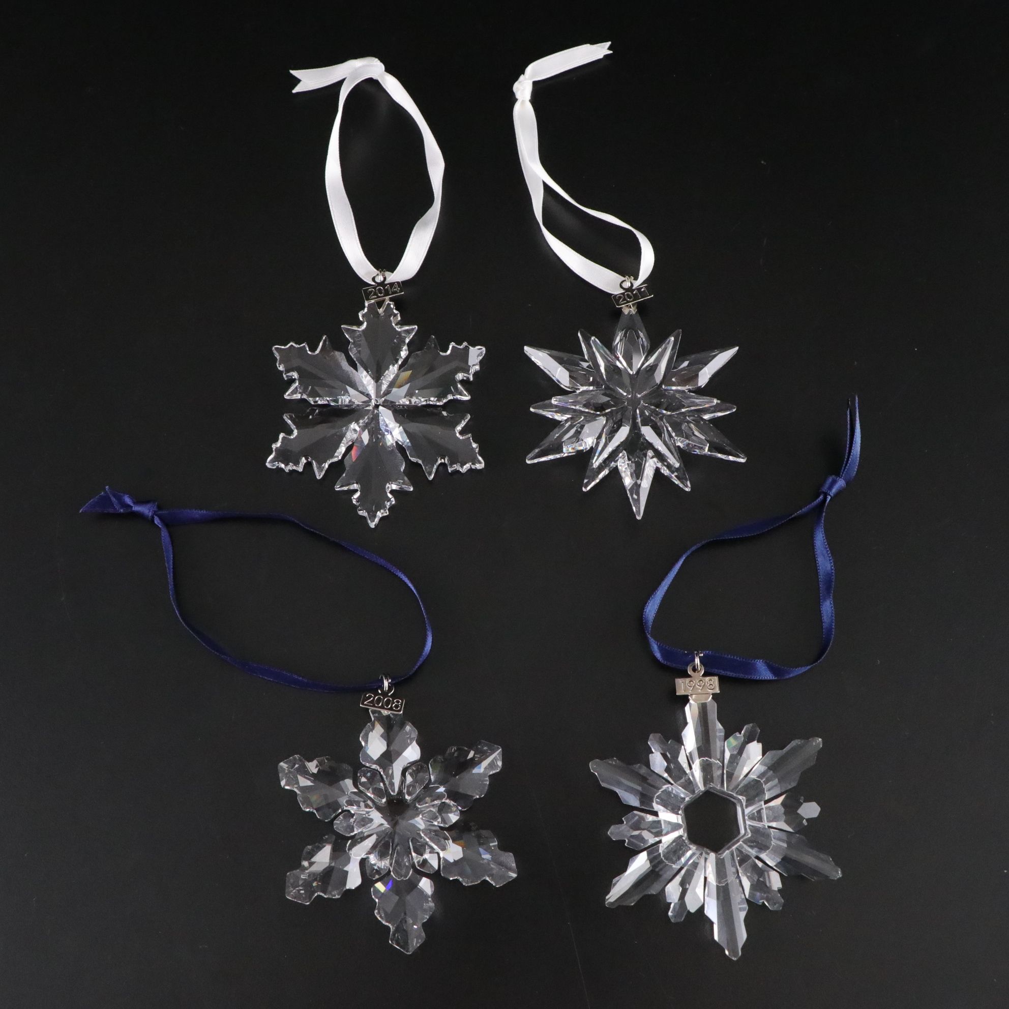 Four Swarovski Crystal Christmas Ornaments,1998, 2008, 2011, and 2014