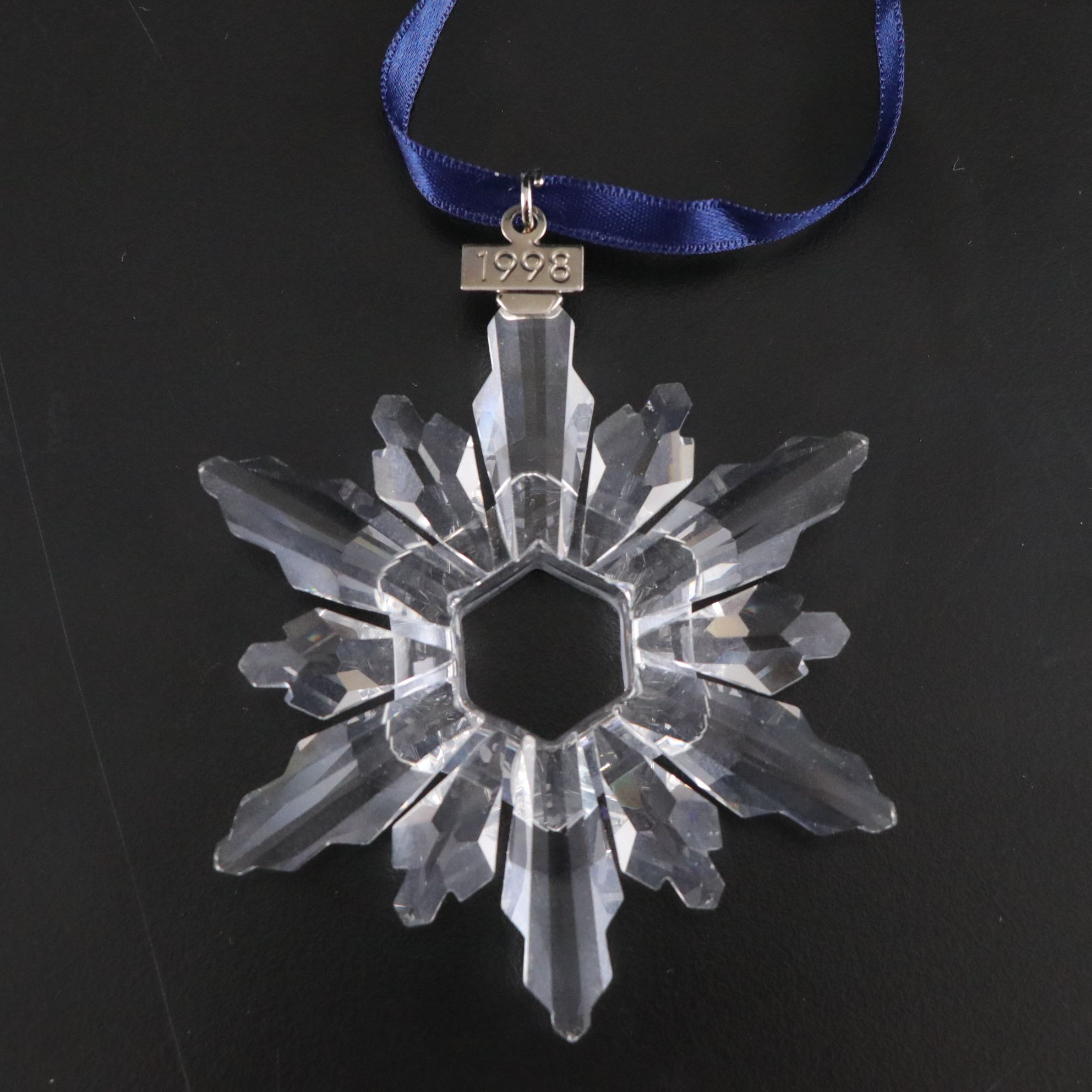 Four Swarovski Crystal Christmas Ornaments,1998, 2008, 2011, and 2014