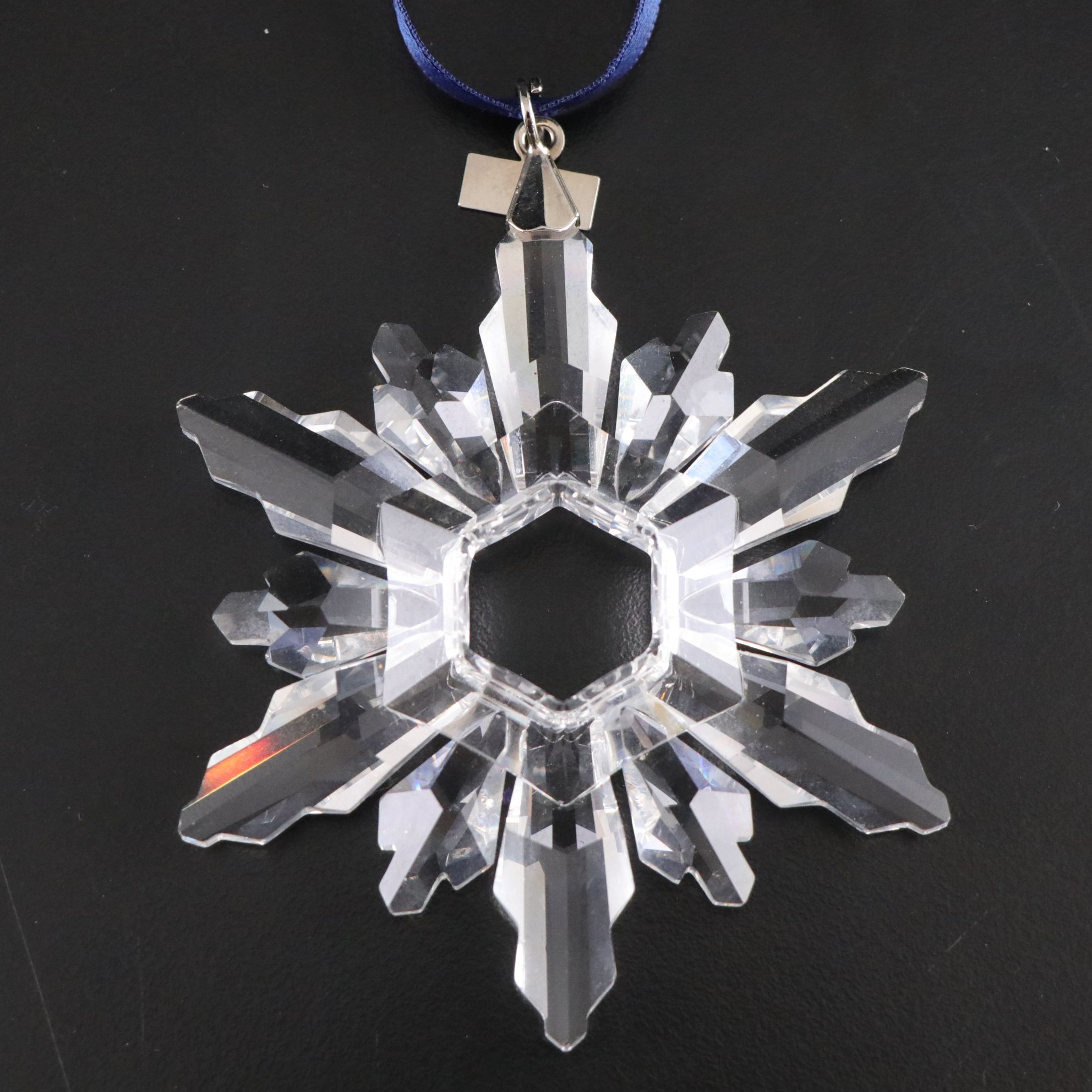 Four Swarovski Crystal Christmas Ornaments,1998, 2008, 2011, and 2014