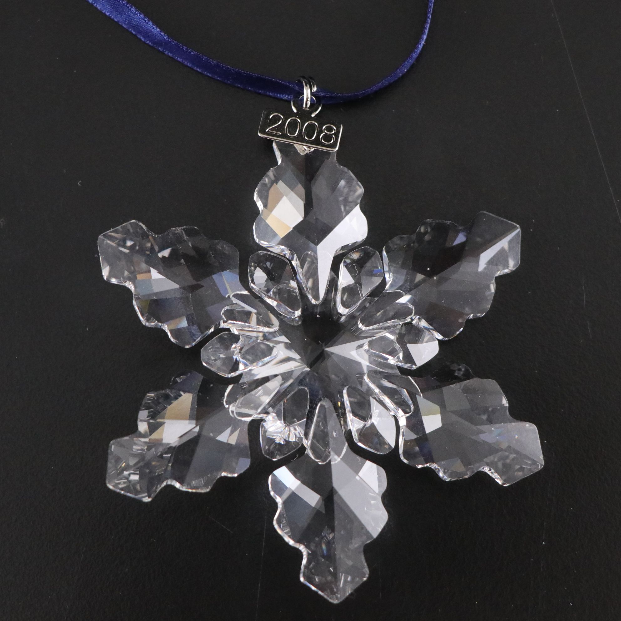 Four Swarovski Crystal Christmas Ornaments,1998, 2008, 2011, and 2014