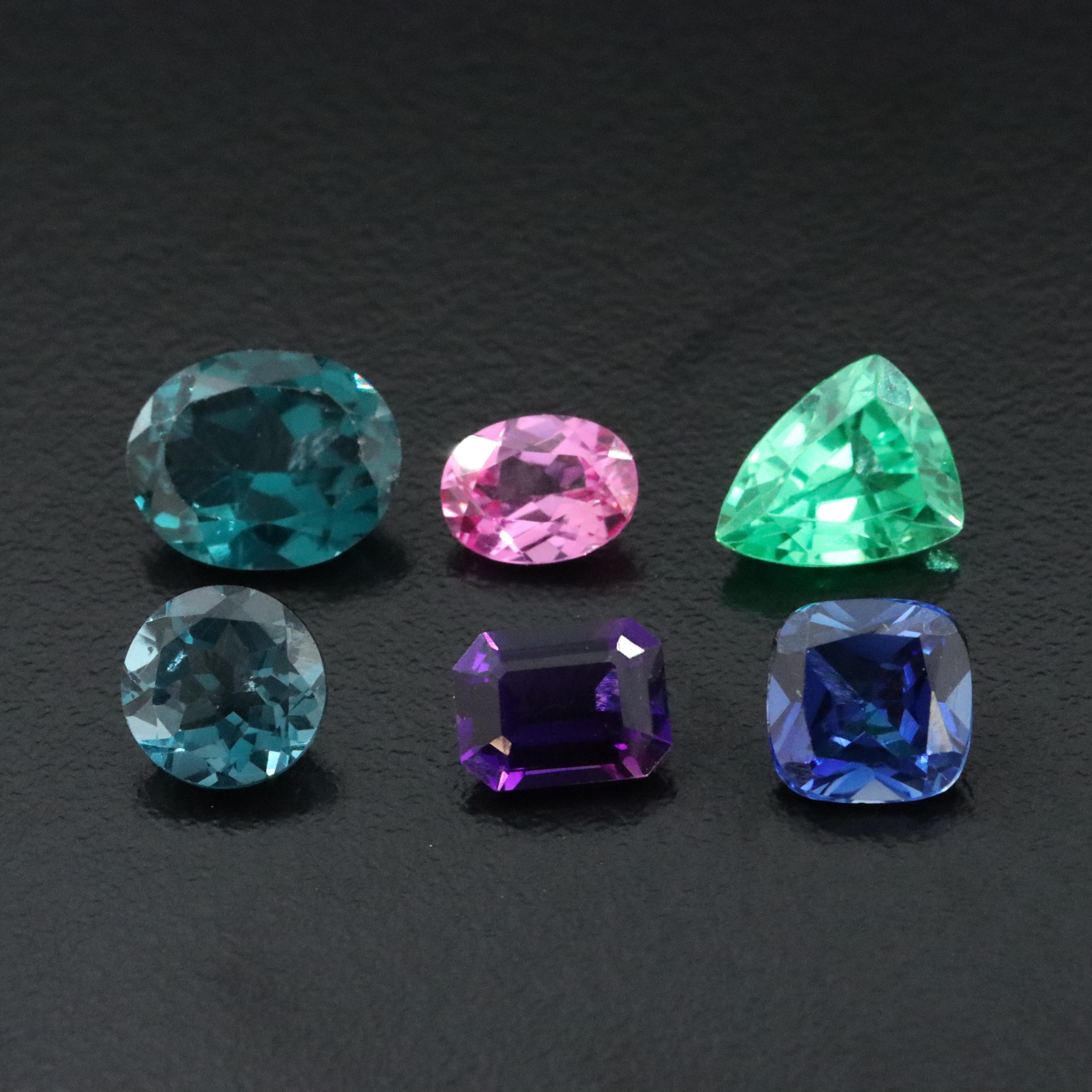 Loose 14.93 CTW Gemstones Including Lab Grown Pink Sapphire and Lab Grown Spinel