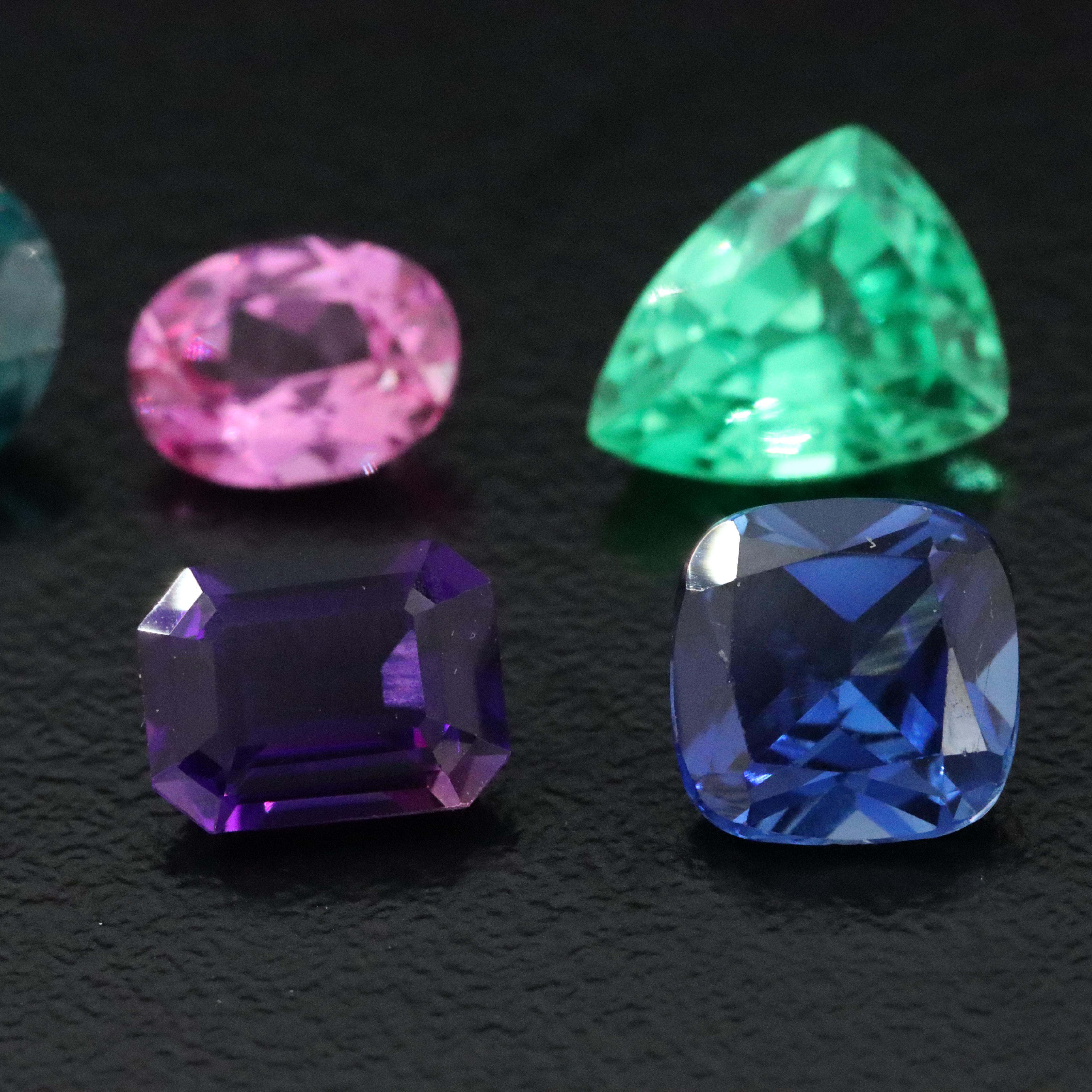 Loose 14.93 CTW Gemstones Including Lab Grown Pink Sapphire and Lab Grown Spinel