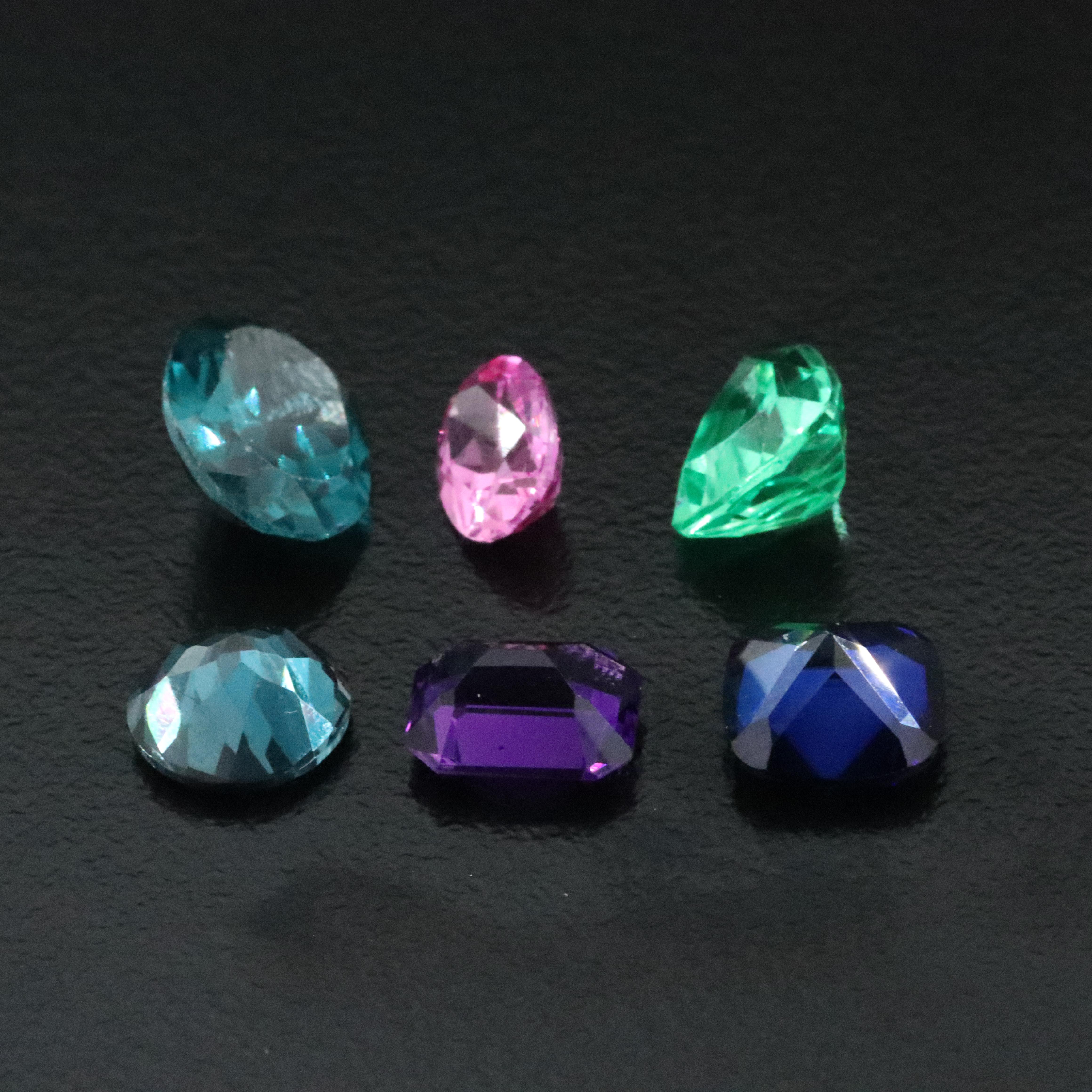 Loose 14.93 CTW Gemstones Including Lab Grown Pink Sapphire and Lab Grown Spinel