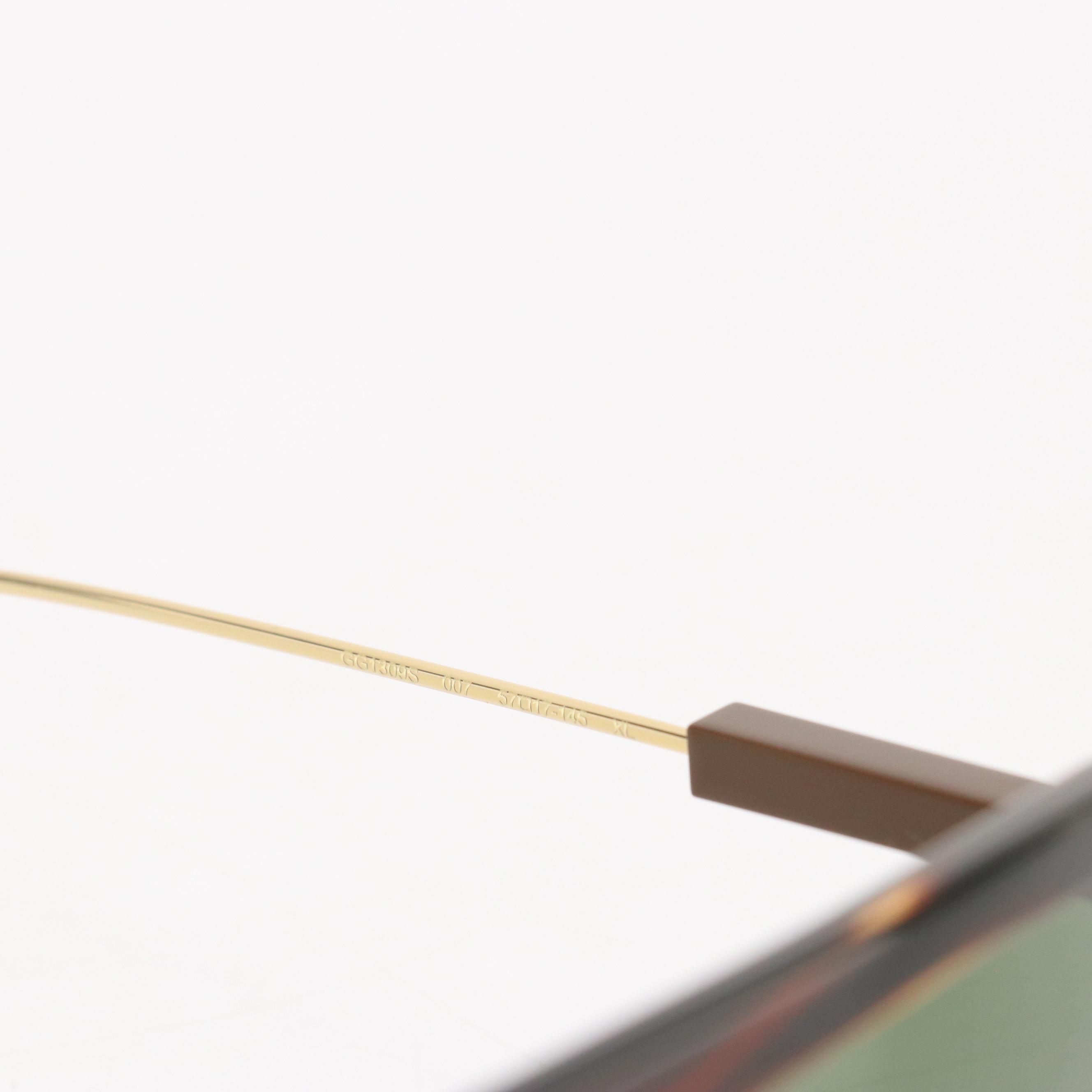 Gucci GG1309S 007 Green Lens Havana Sunglasses in Case