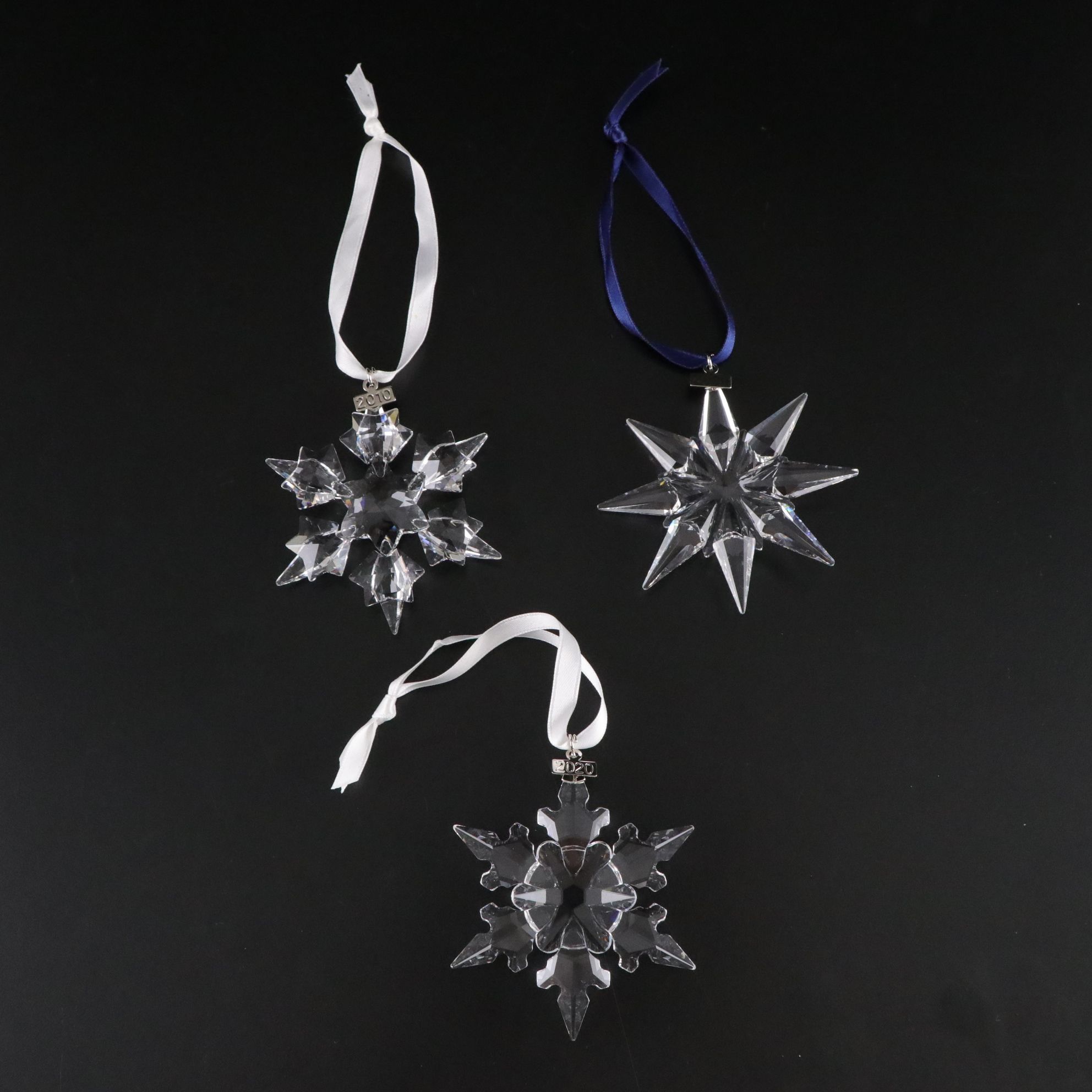 Three Swarovski Crystal Christmas Ornaments, 2009, 2010, and 2020