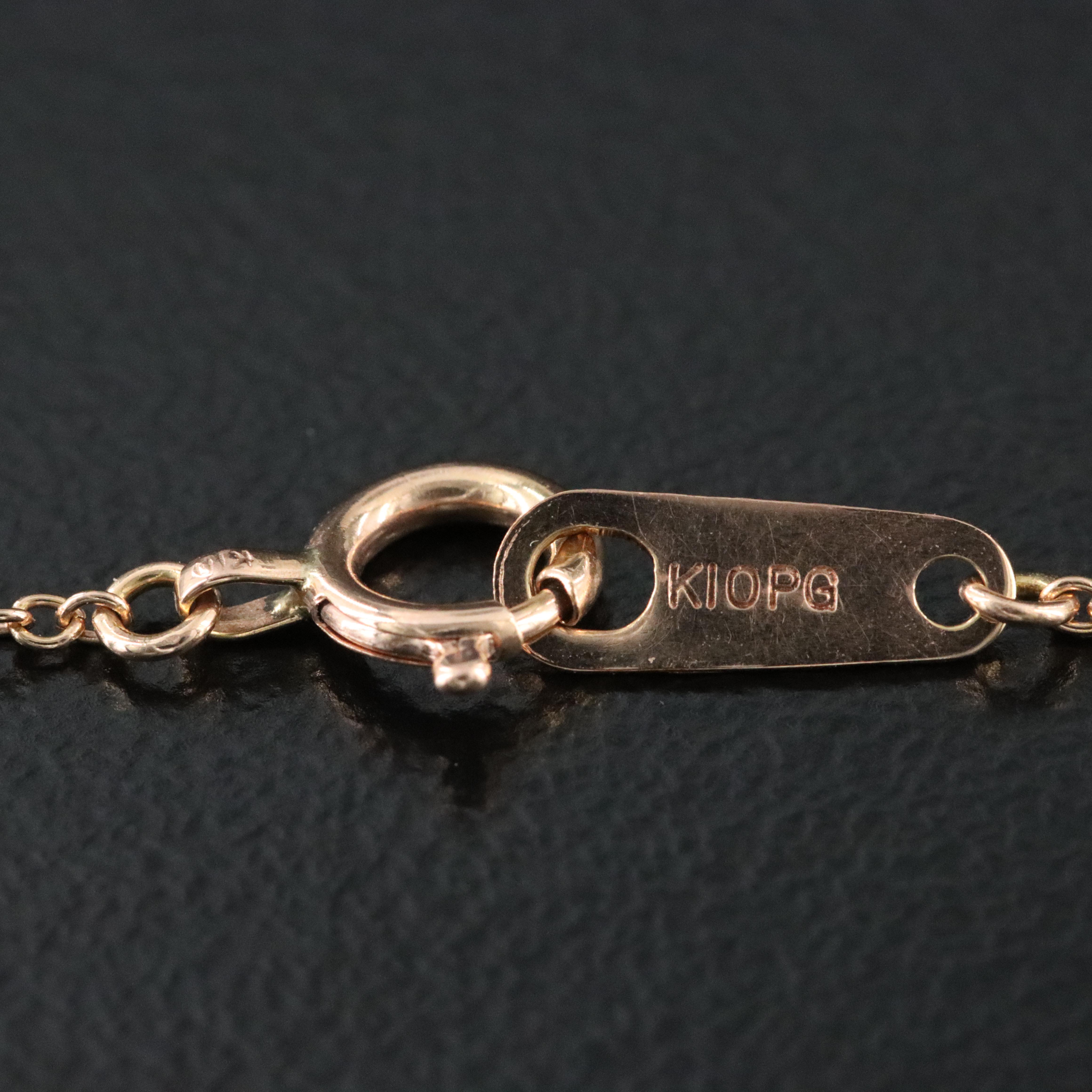 10K Rose Gold 0.04 CTW Diamond Cross Necklace