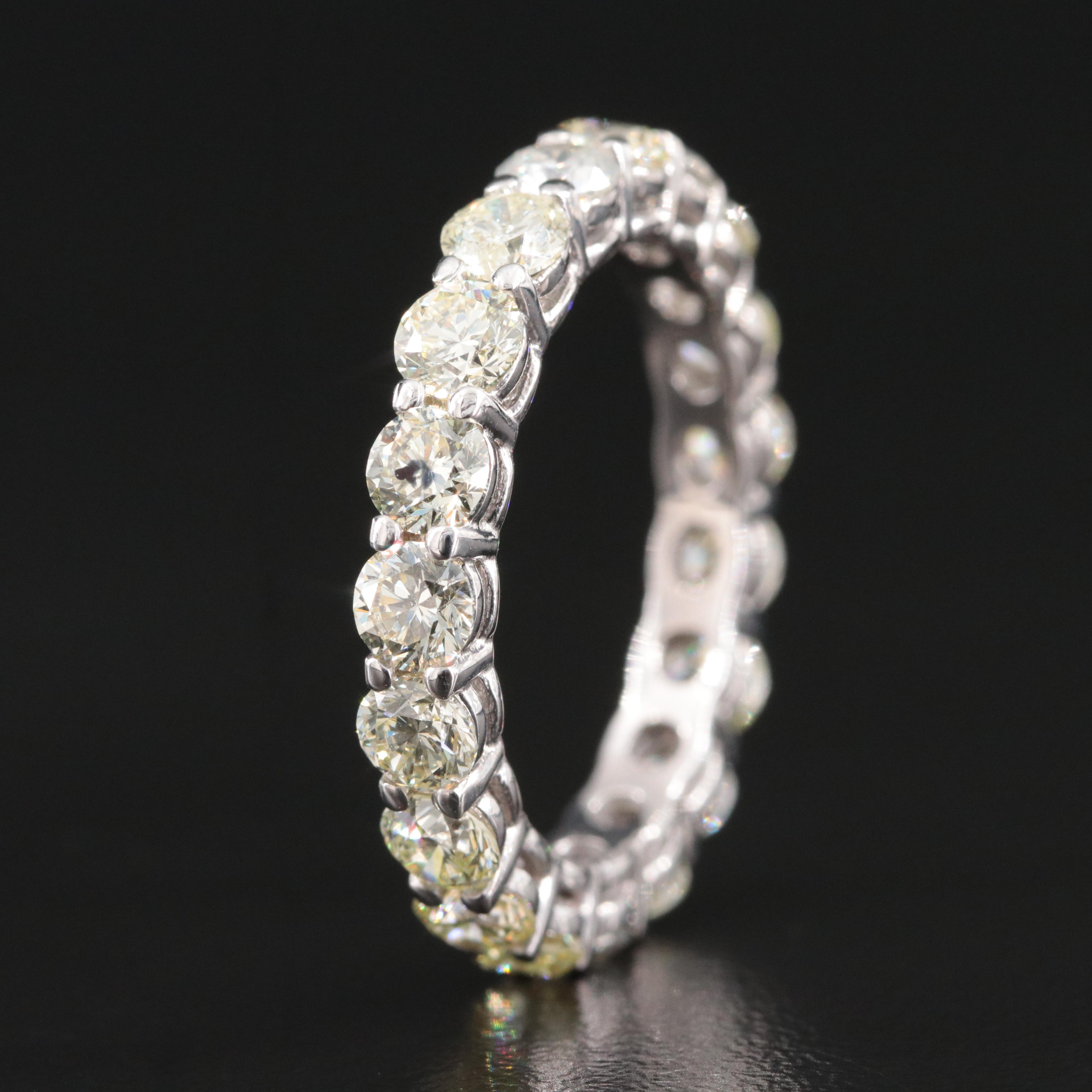 18K 3.54 CTW Diamond Eternity and with IGI Jewelry Report with Fancy Diamonds