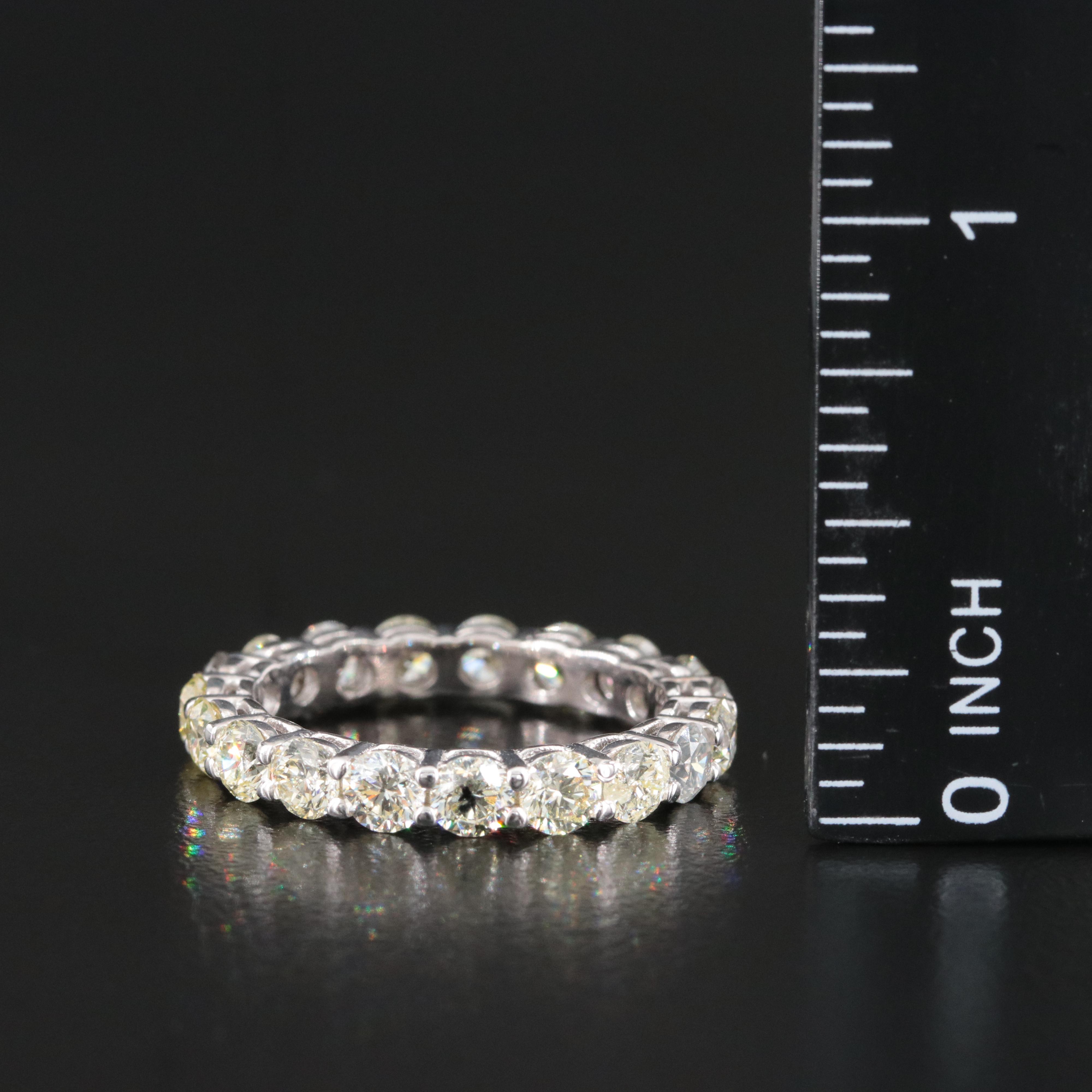 18K 3.54 CTW Diamond Eternity and with IGI Jewelry Report with Fancy Diamonds