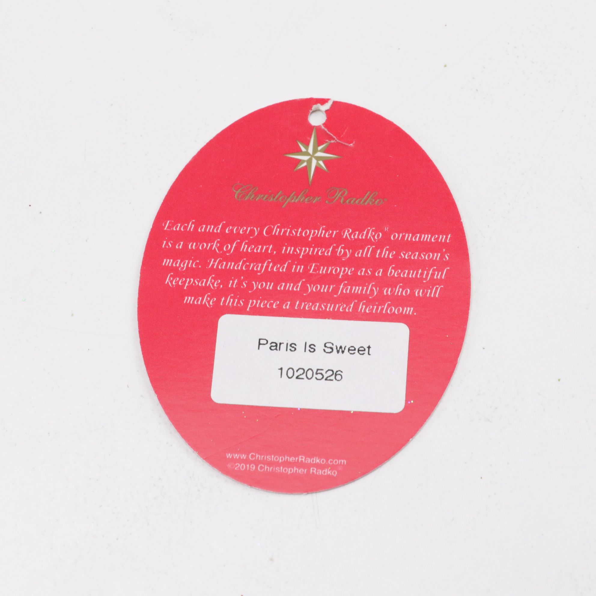 Four Christopher Radko Glass Christmas Ornaments with "Paris is Sweet"