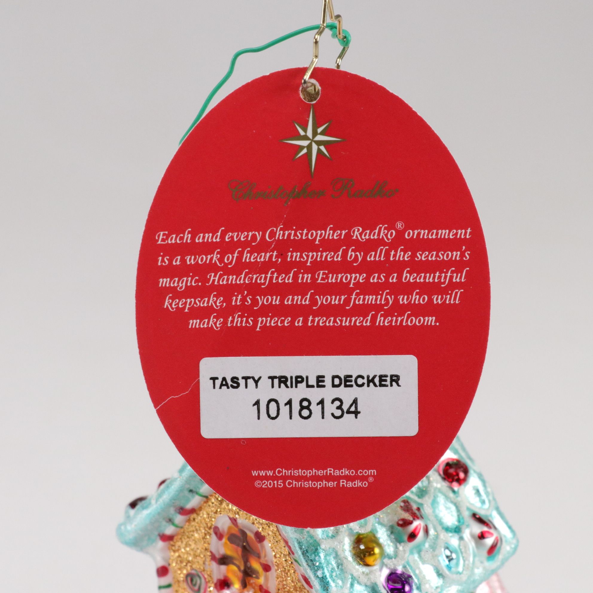 Four Christopher Radko Glass Christmas Ornaments with "Paris is Sweet"