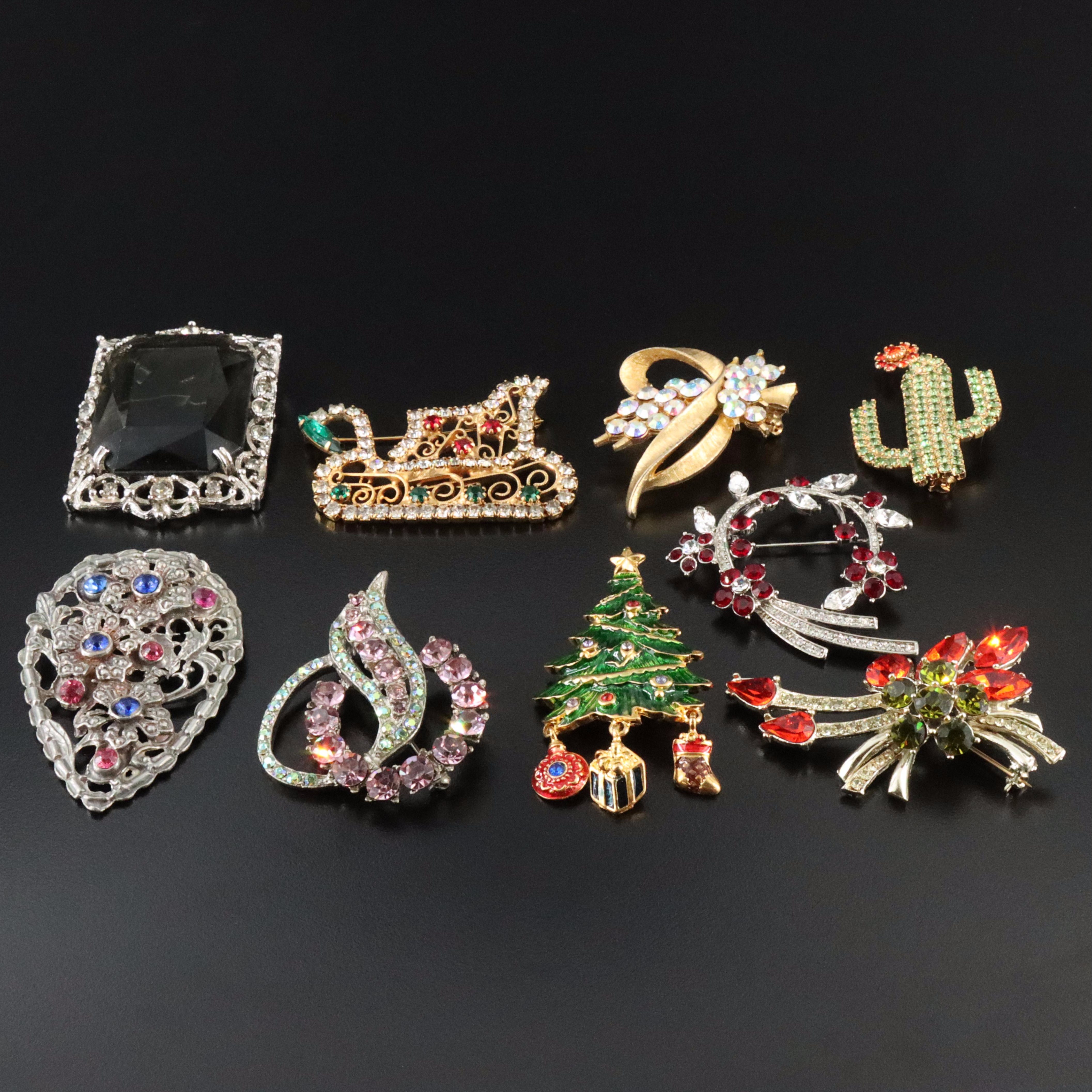 Vintage Brooch Collection Featuring Christmas Theme and Dress Clip