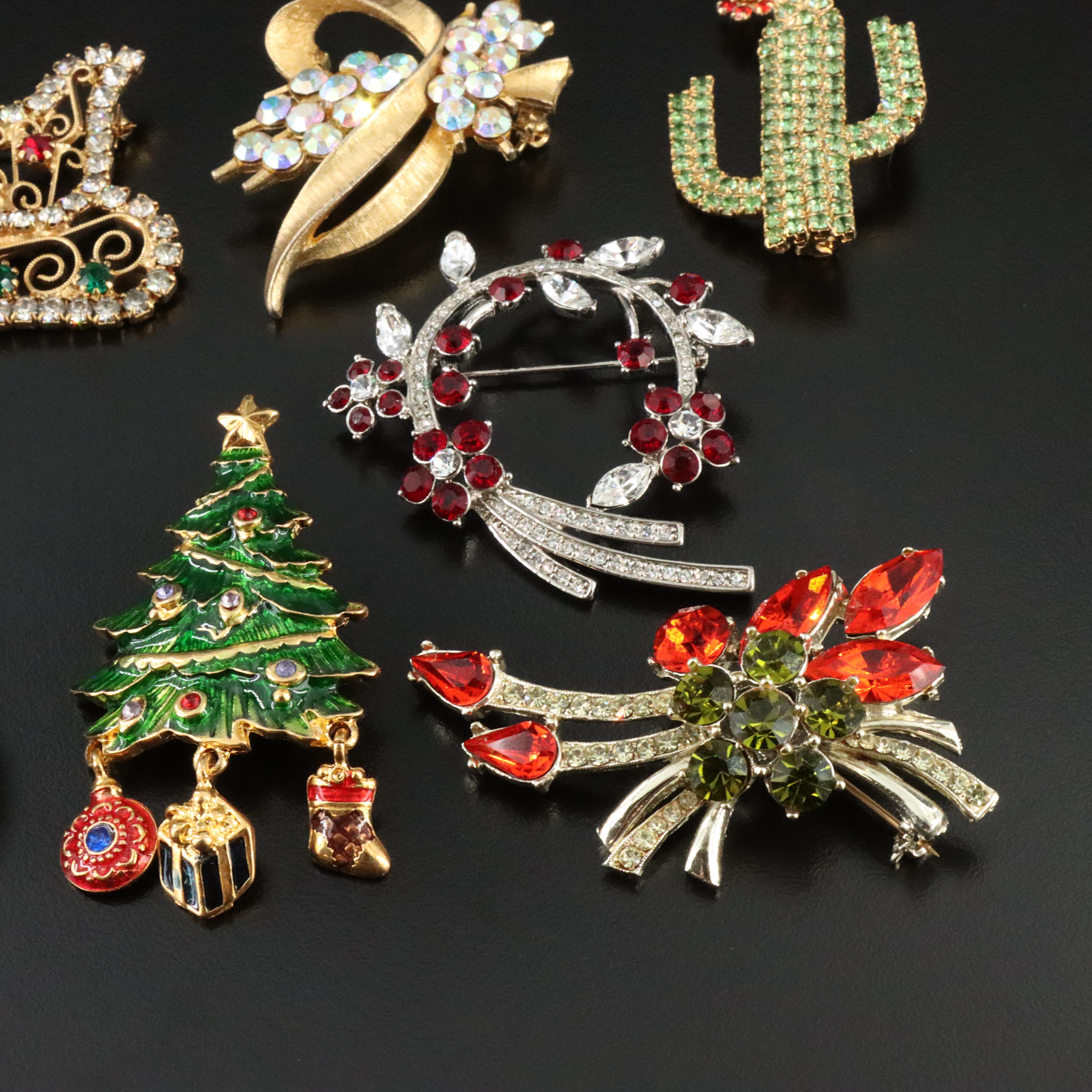 Vintage Brooch Collection Featuring Christmas Theme and Dress Clip