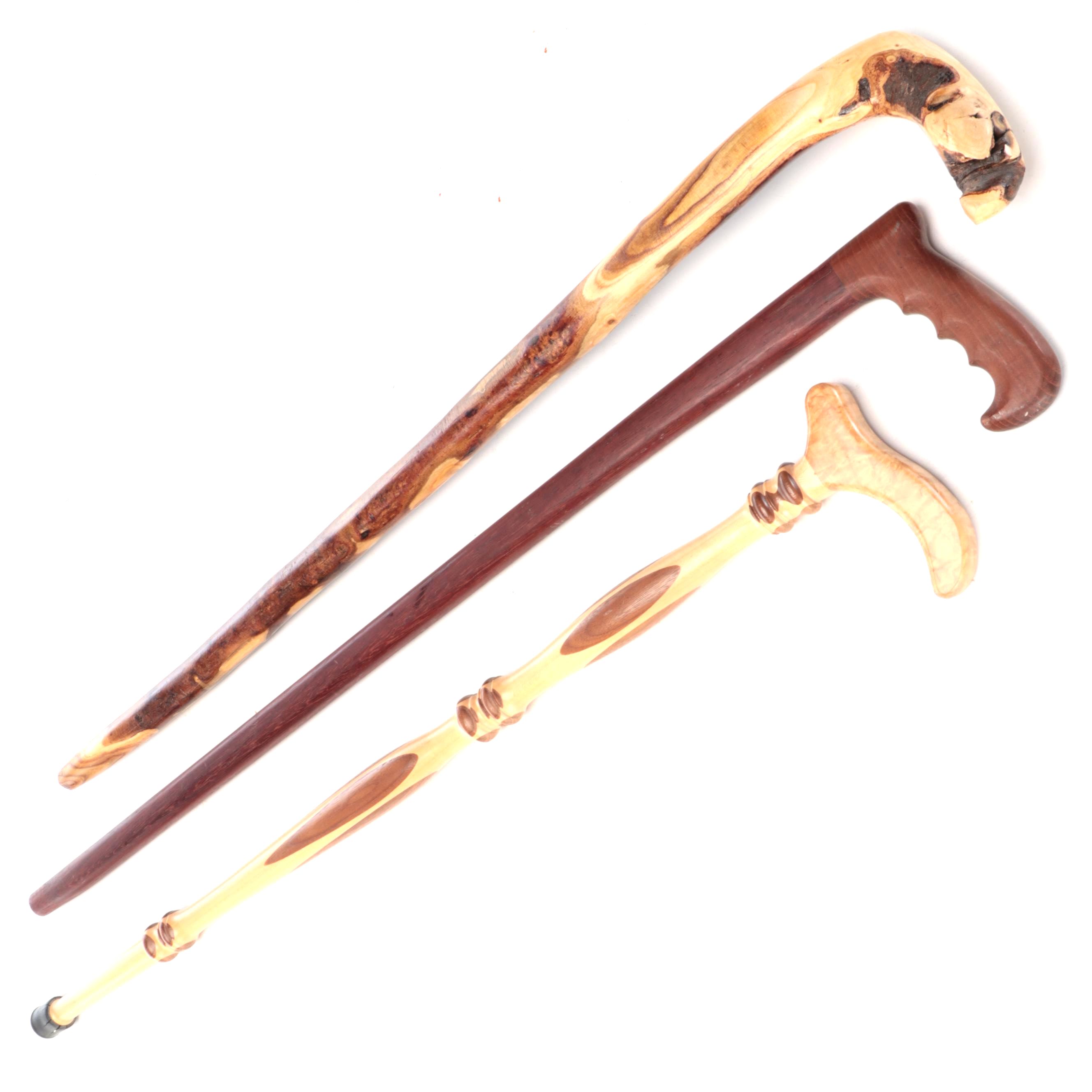 Sam P. Schrock with Other Hand-Carved Wooden Walking Sticks.