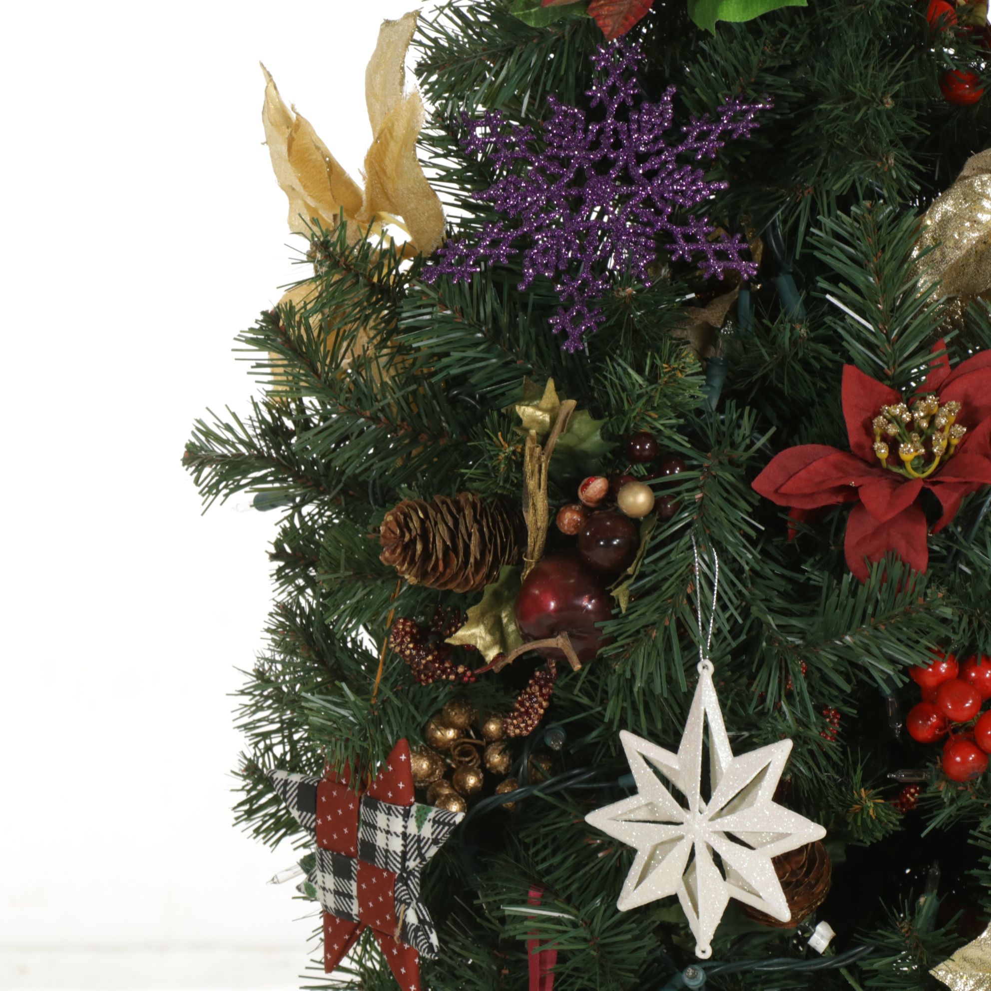 Lighted Artificial Christmas Tree with Poinsettias and Other Ornaments