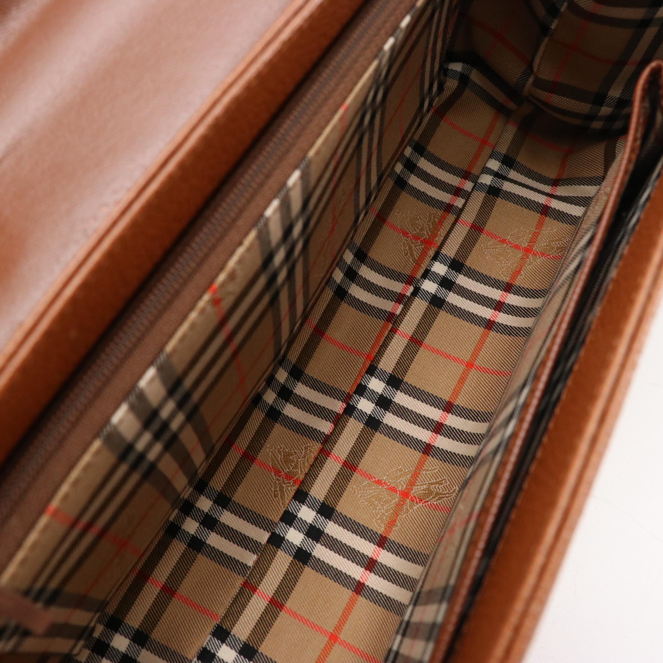 Burberrys Top Handle Handbag in Brown Grained and Smooth Leather