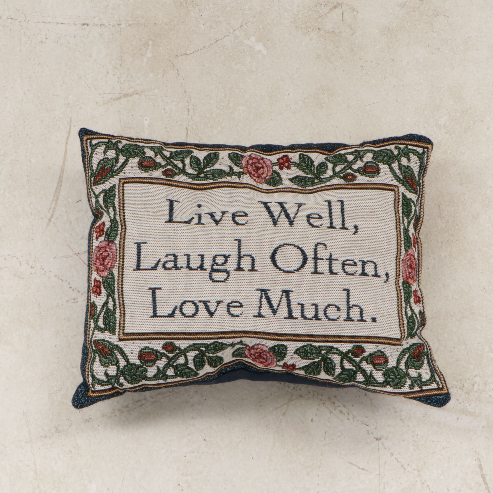 Decorative Pillows with Quotes and Motifs and Roll of Fringed Tassels