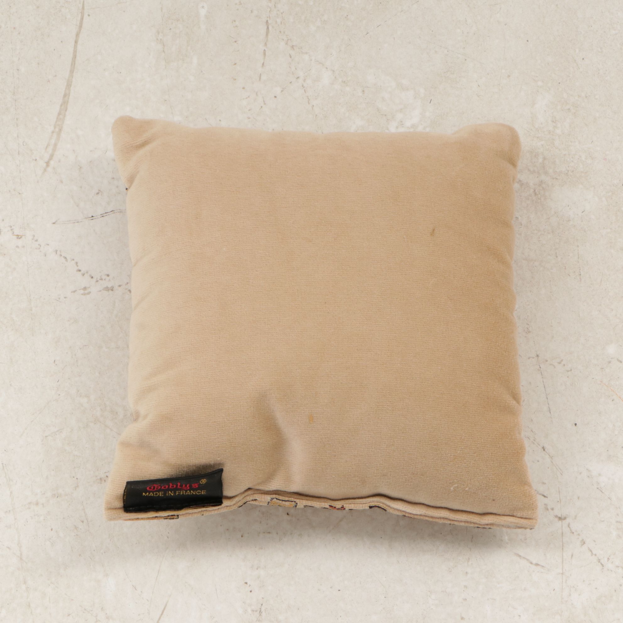 Decorative Pillows with Quotes and Motifs and Roll of Fringed Tassels