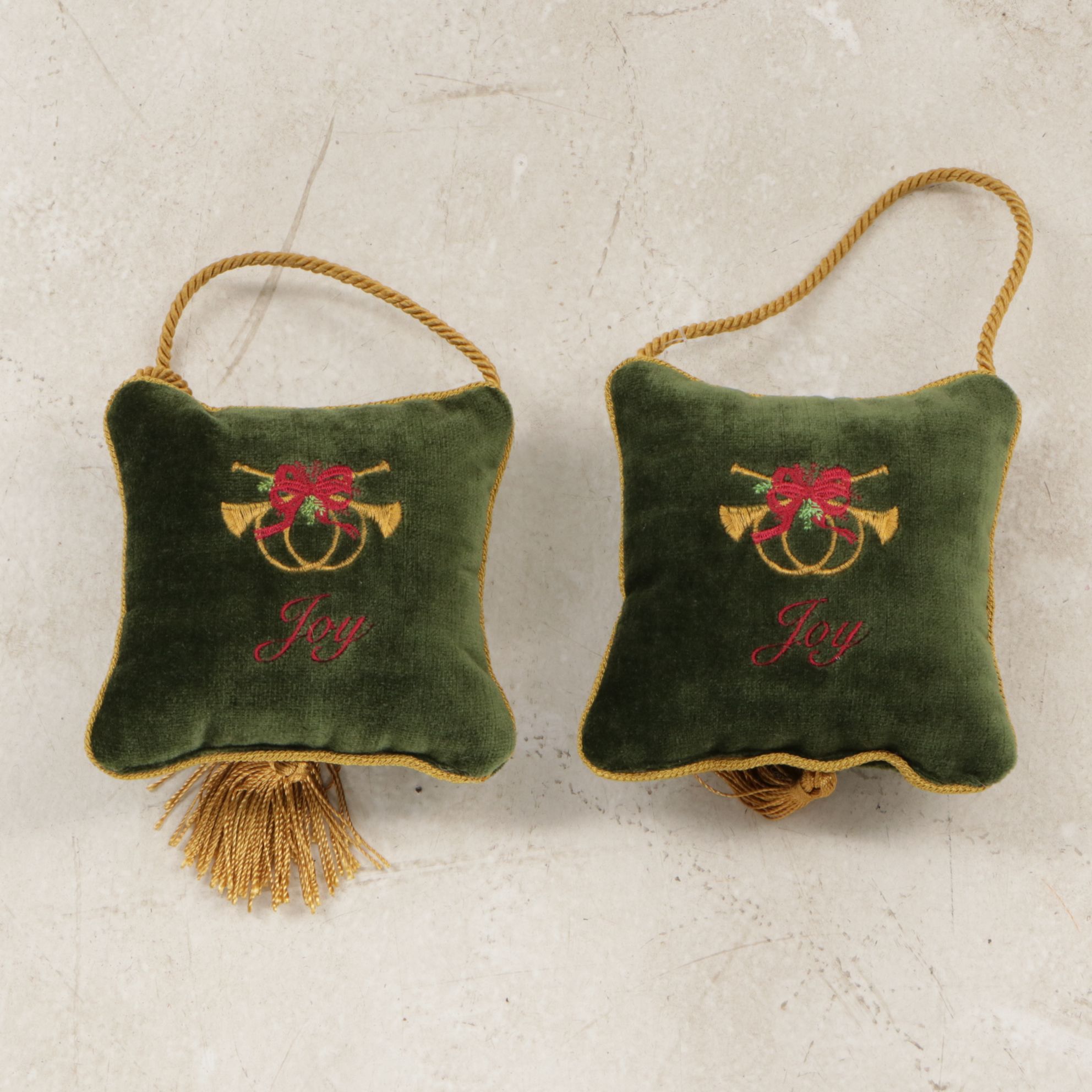 Decorative Pillows with Quotes and Motifs and Roll of Fringed Tassels