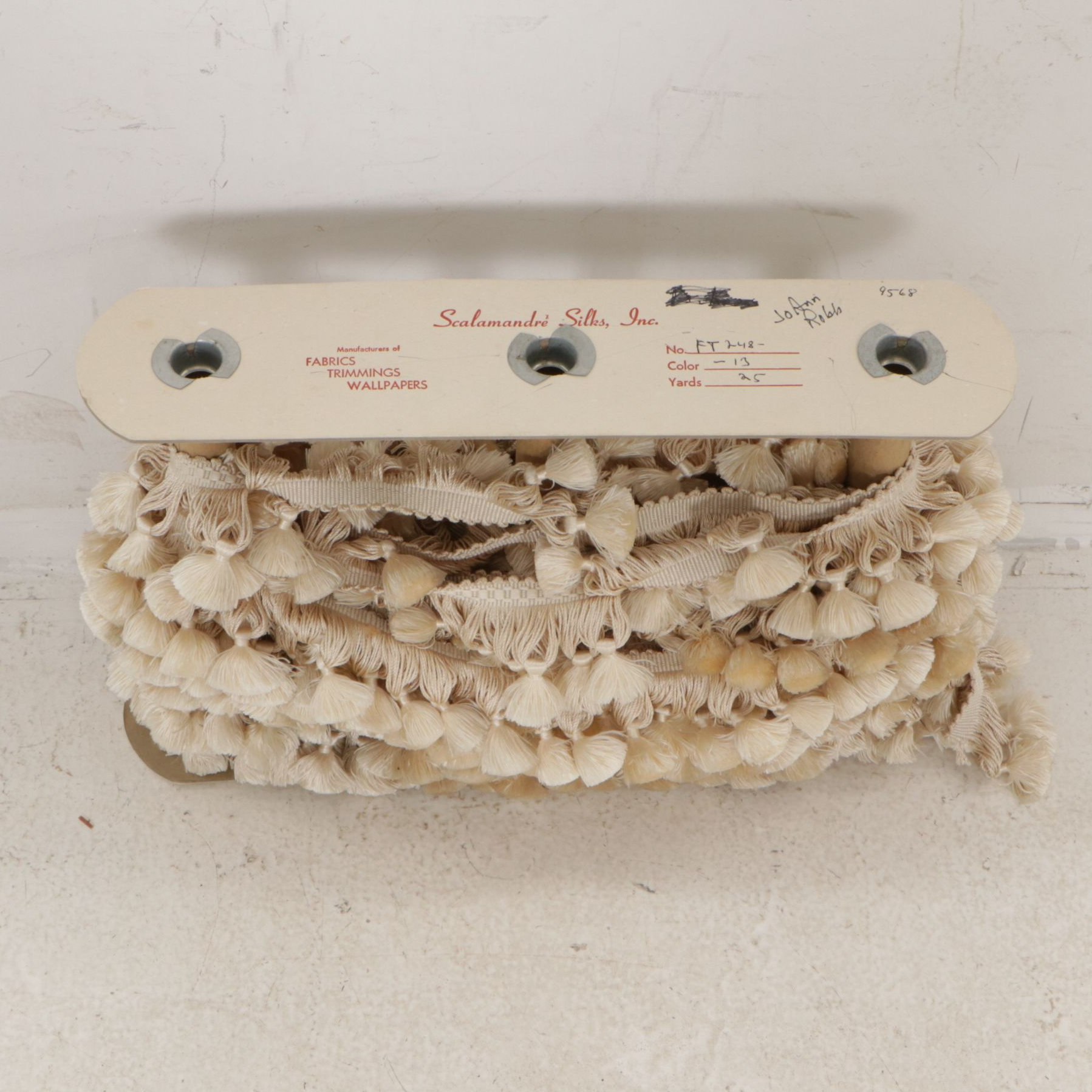 Decorative Pillows with Quotes and Motifs and Roll of Fringed Tassels