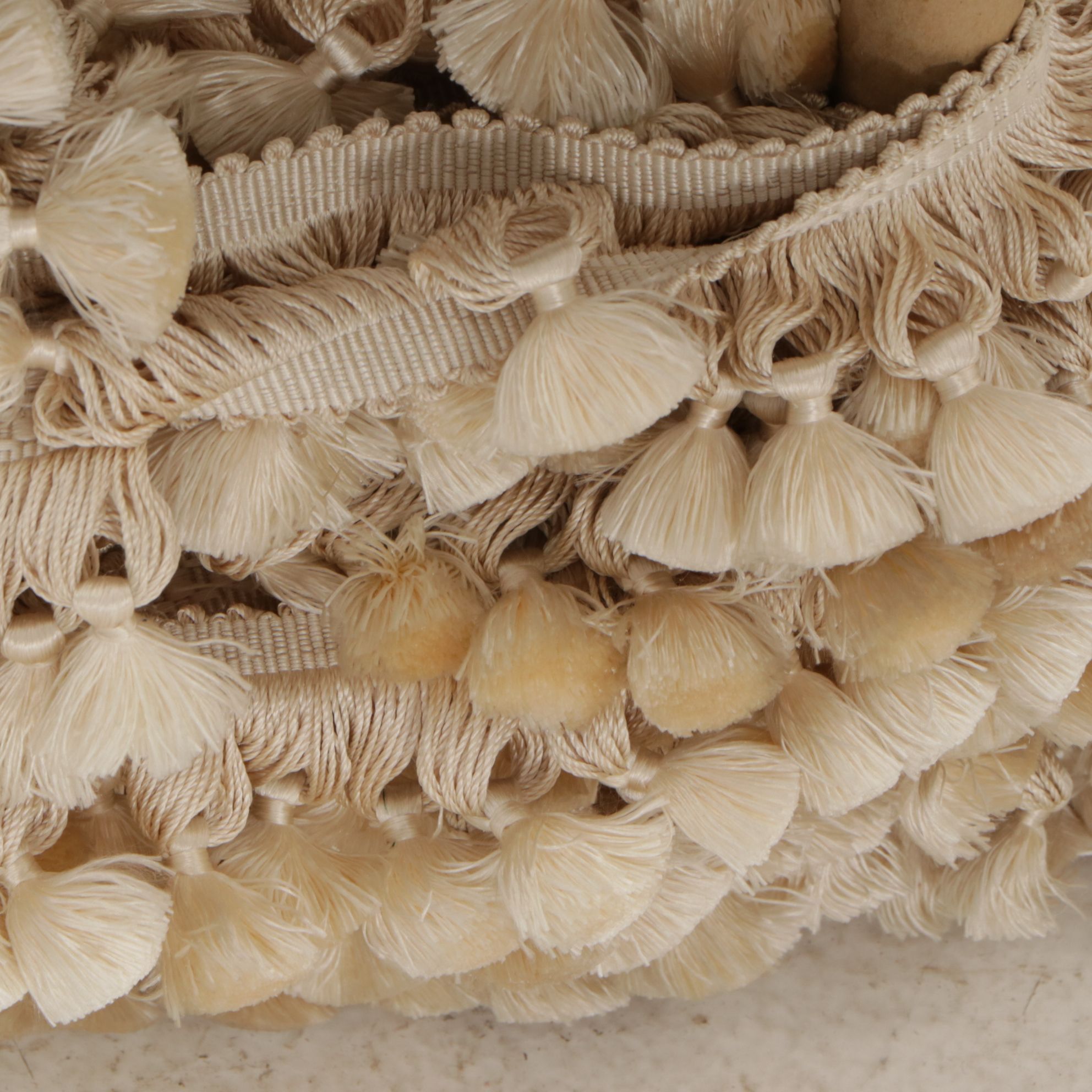 Decorative Pillows with Quotes and Motifs and Roll of Fringed Tassels