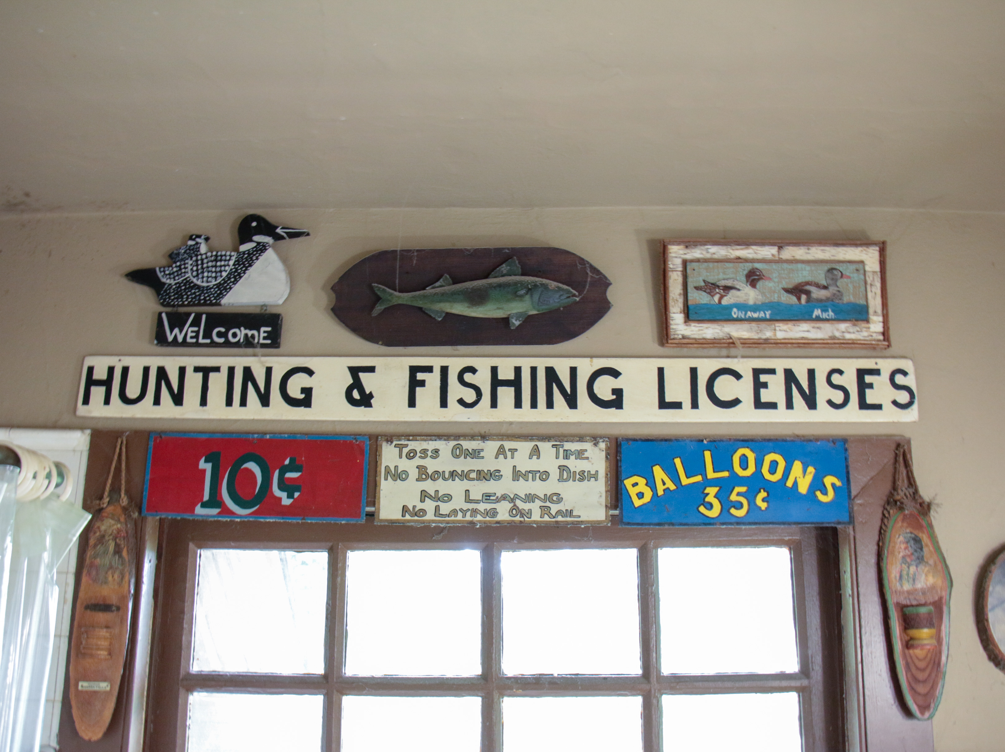 Times-Star Newspaper with Other Advertising Signs, Mid-20th Century