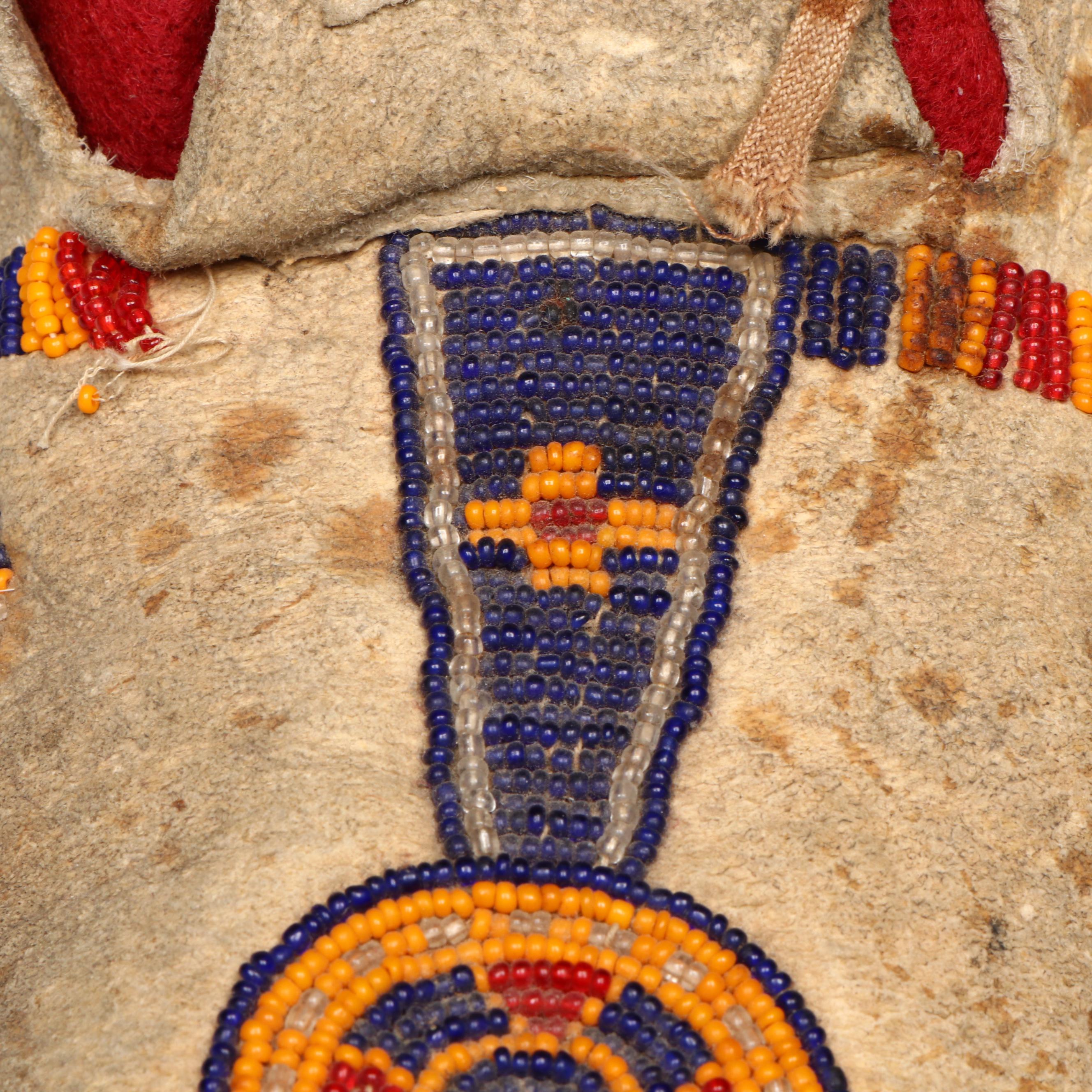 Pair of Indigenous Plains Beaded Hide Moccasins