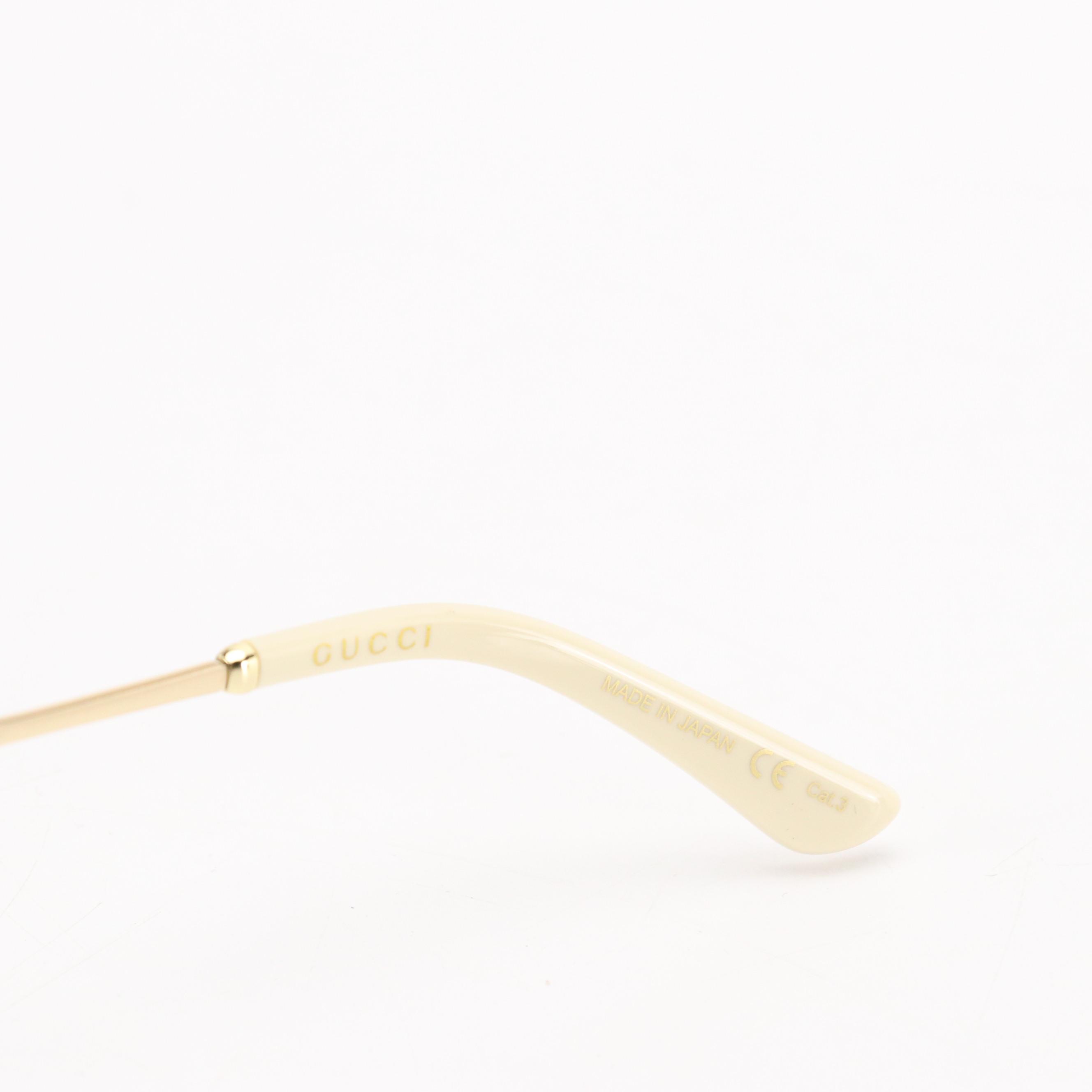 Gucci GG0522S Metal Cat Eye Sunglasses with Red and Green Stripe Arms in Case