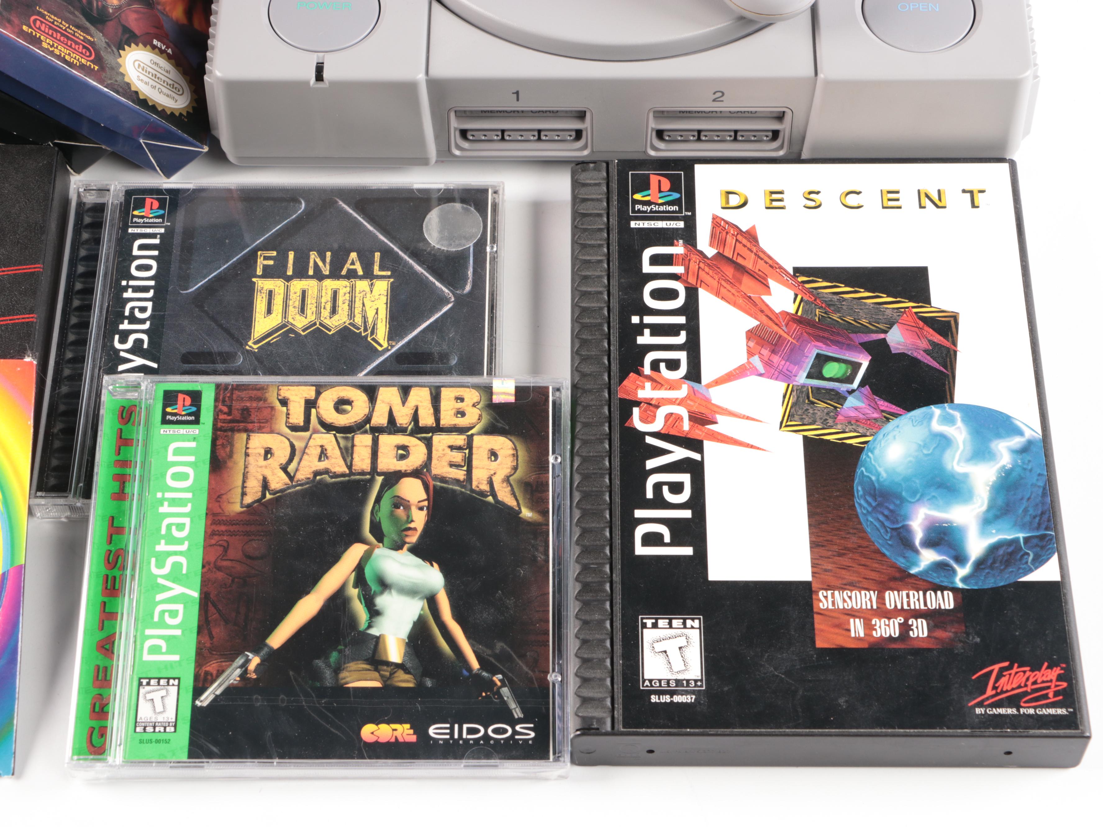 Sony Playstation, Super Nintendo, and Nintendo Gaming Systems with Games