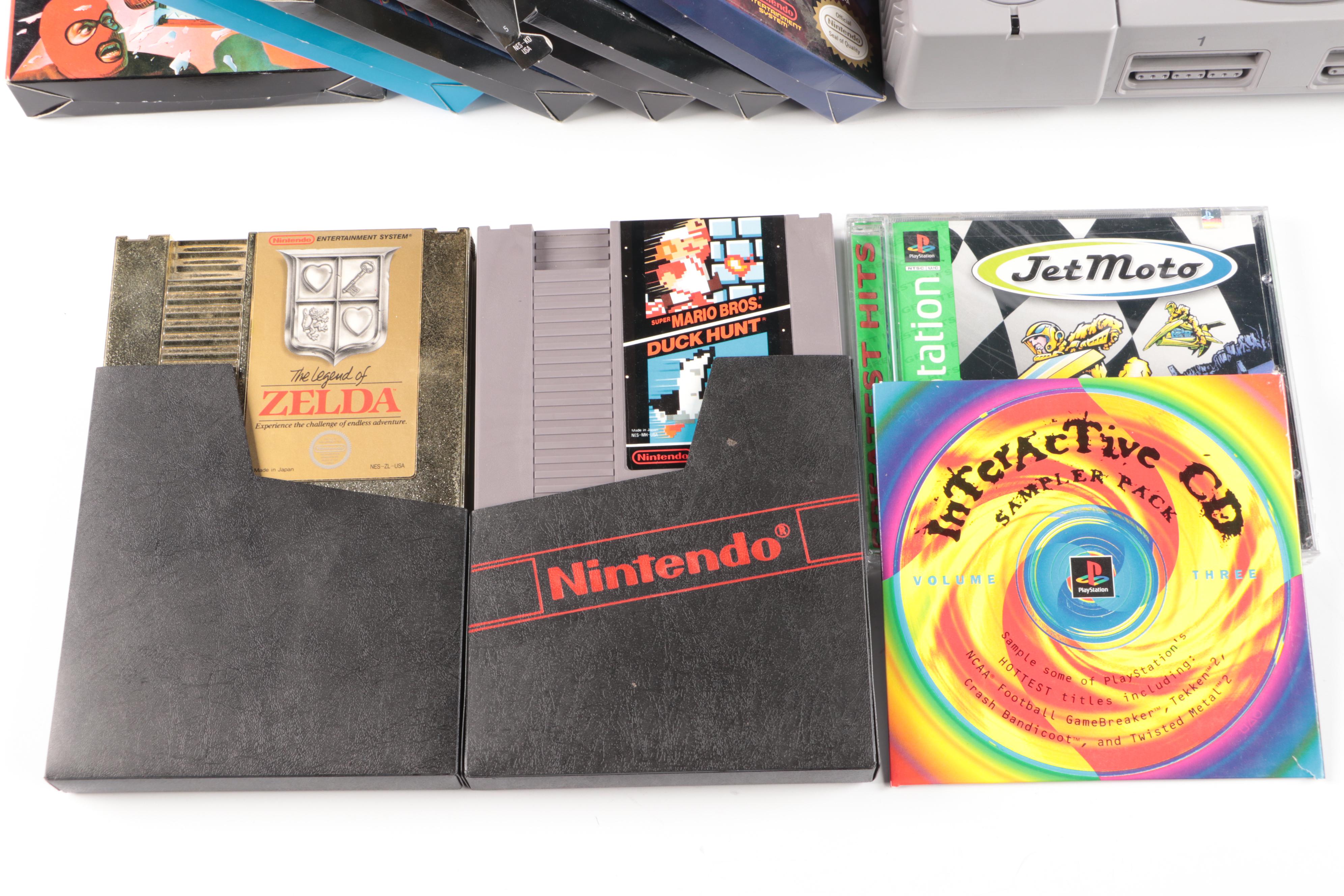 Sony Playstation, Super Nintendo, and Nintendo Gaming Systems with Games
