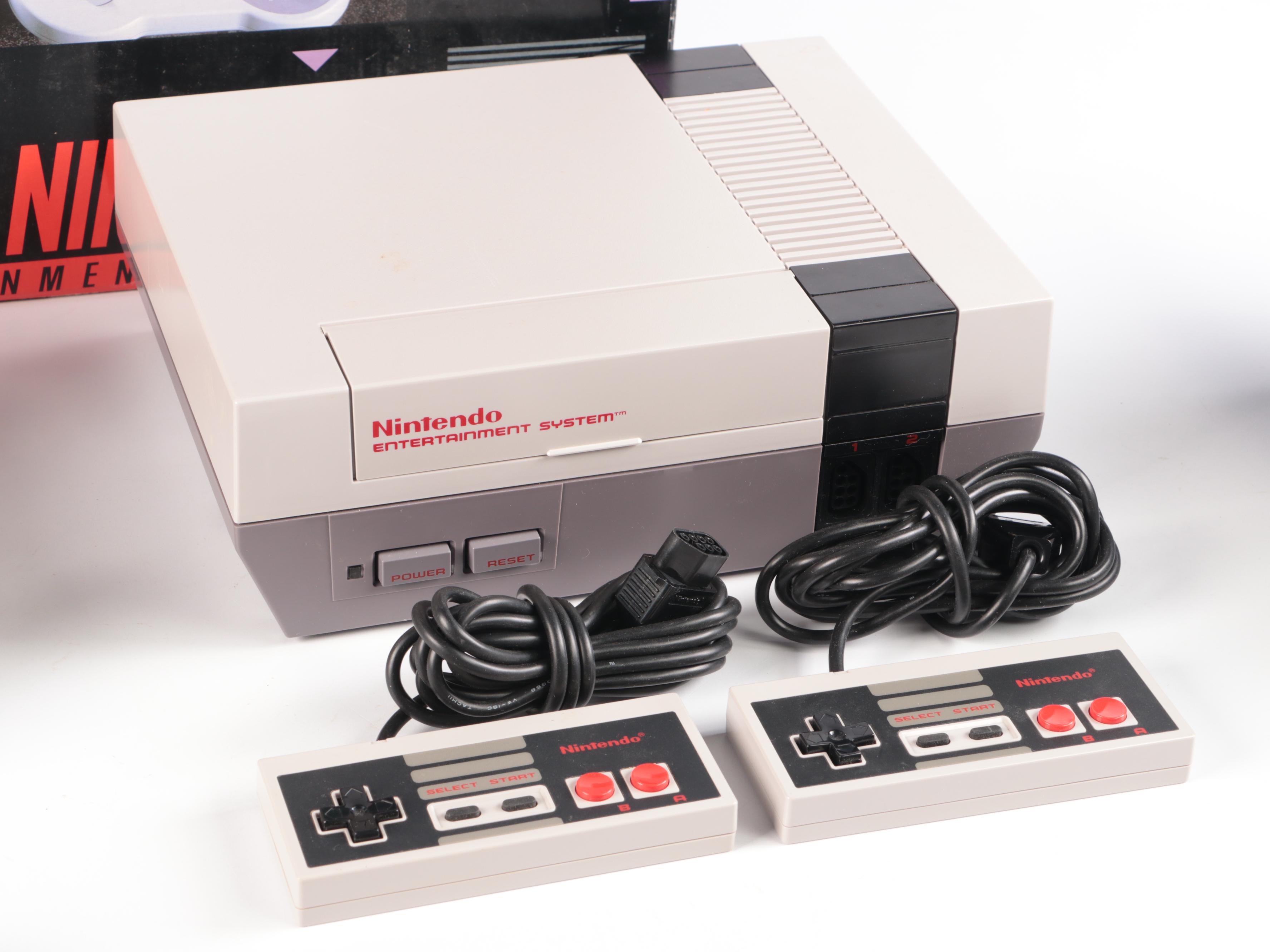 Sony Playstation, Super Nintendo, and Nintendo Gaming Systems with Games