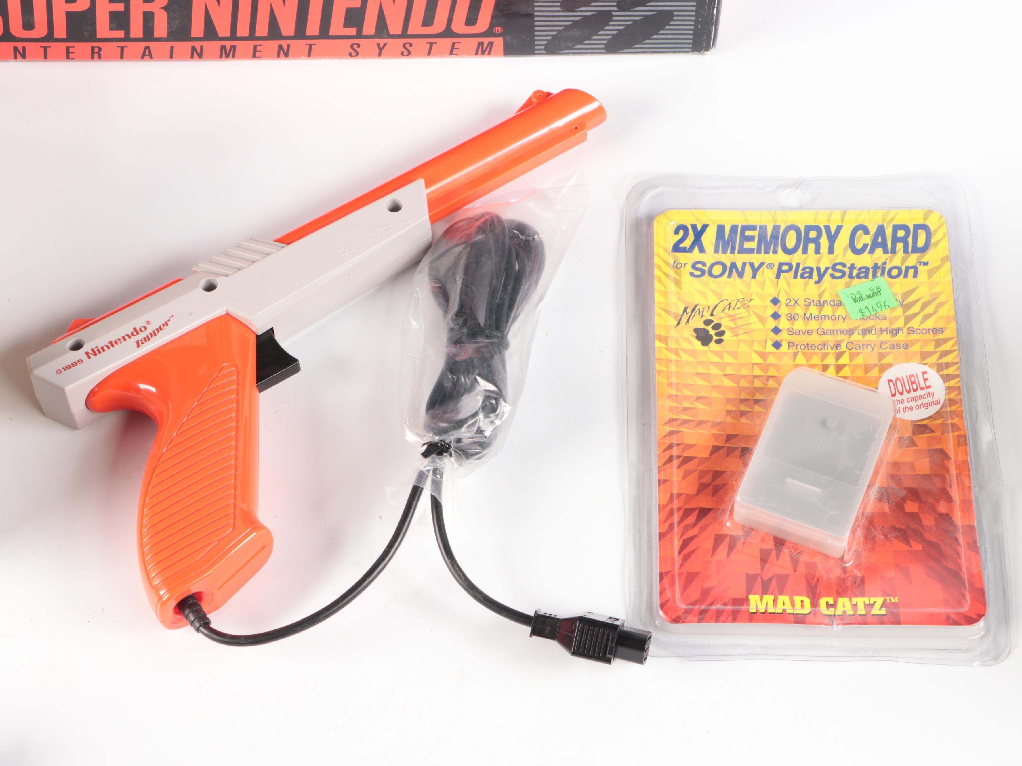 Sony Playstation, Super Nintendo, and Nintendo Gaming Systems with Games