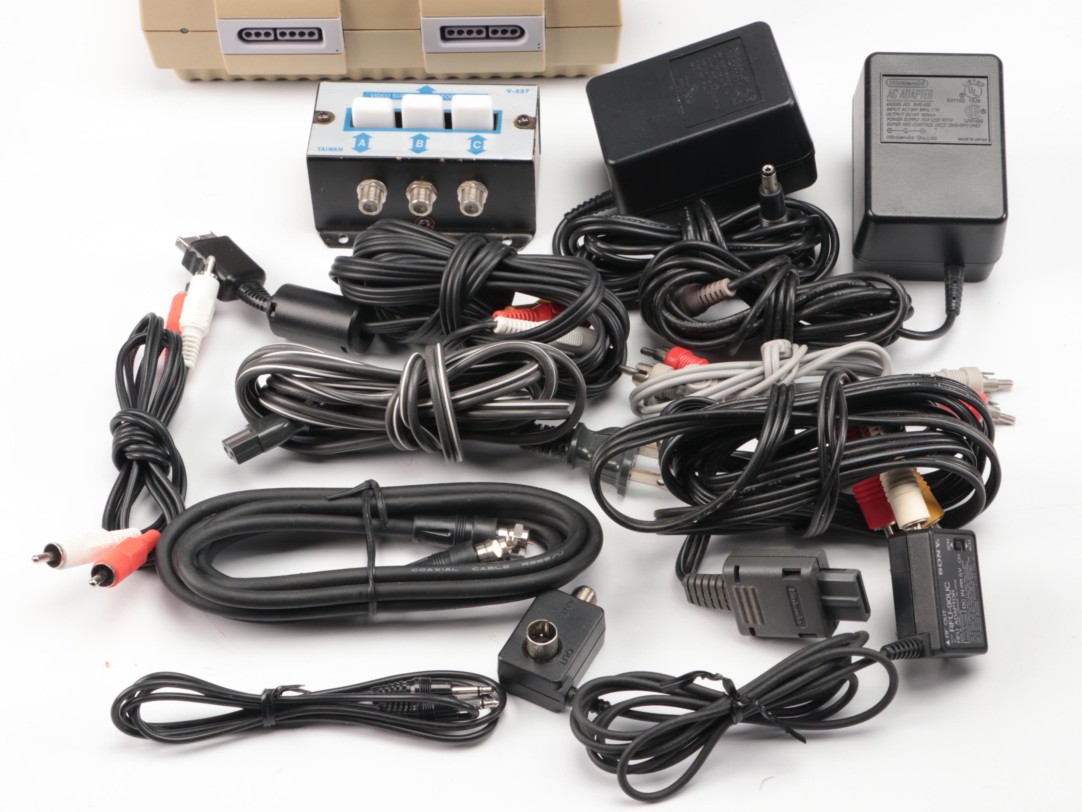 Sony Playstation, Super Nintendo, and Nintendo Gaming Systems with Games