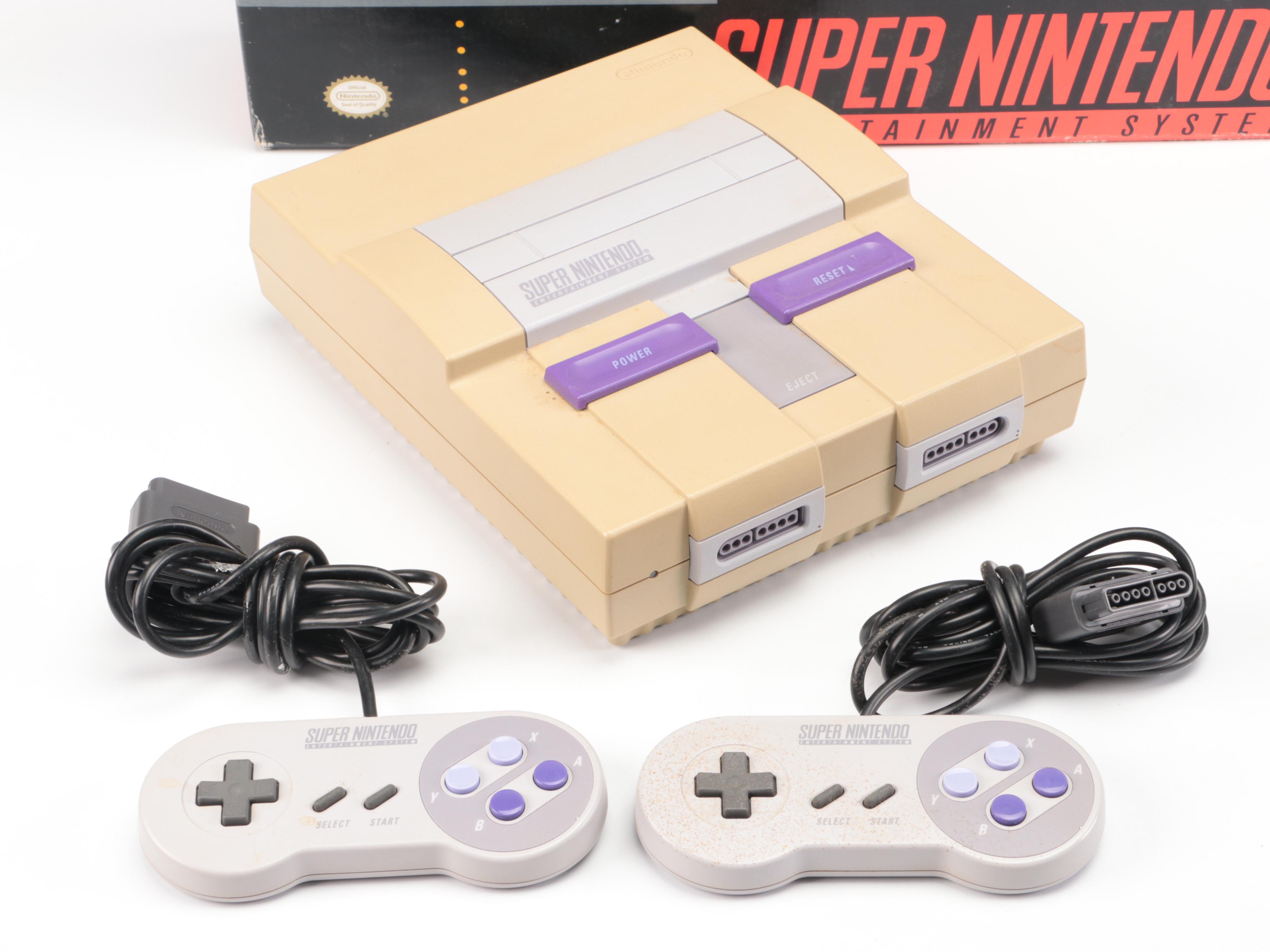 Sony Playstation, Super Nintendo, and Nintendo Gaming Systems with Games