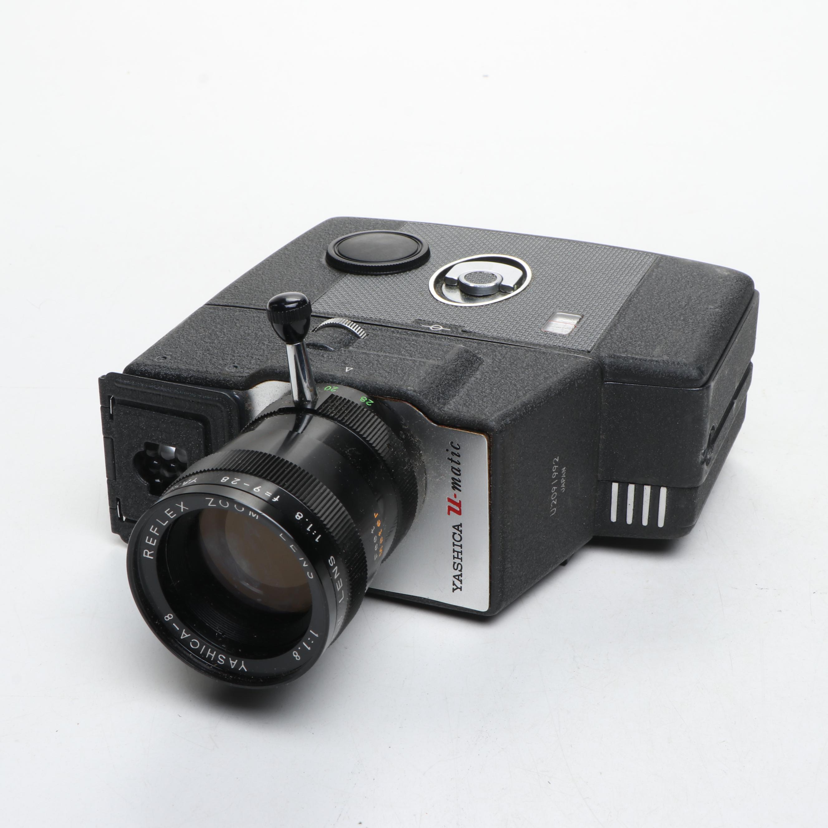 Nikon EL, Yashica-U Matic, and Kodak Retina IIIc Cameras with Lenses