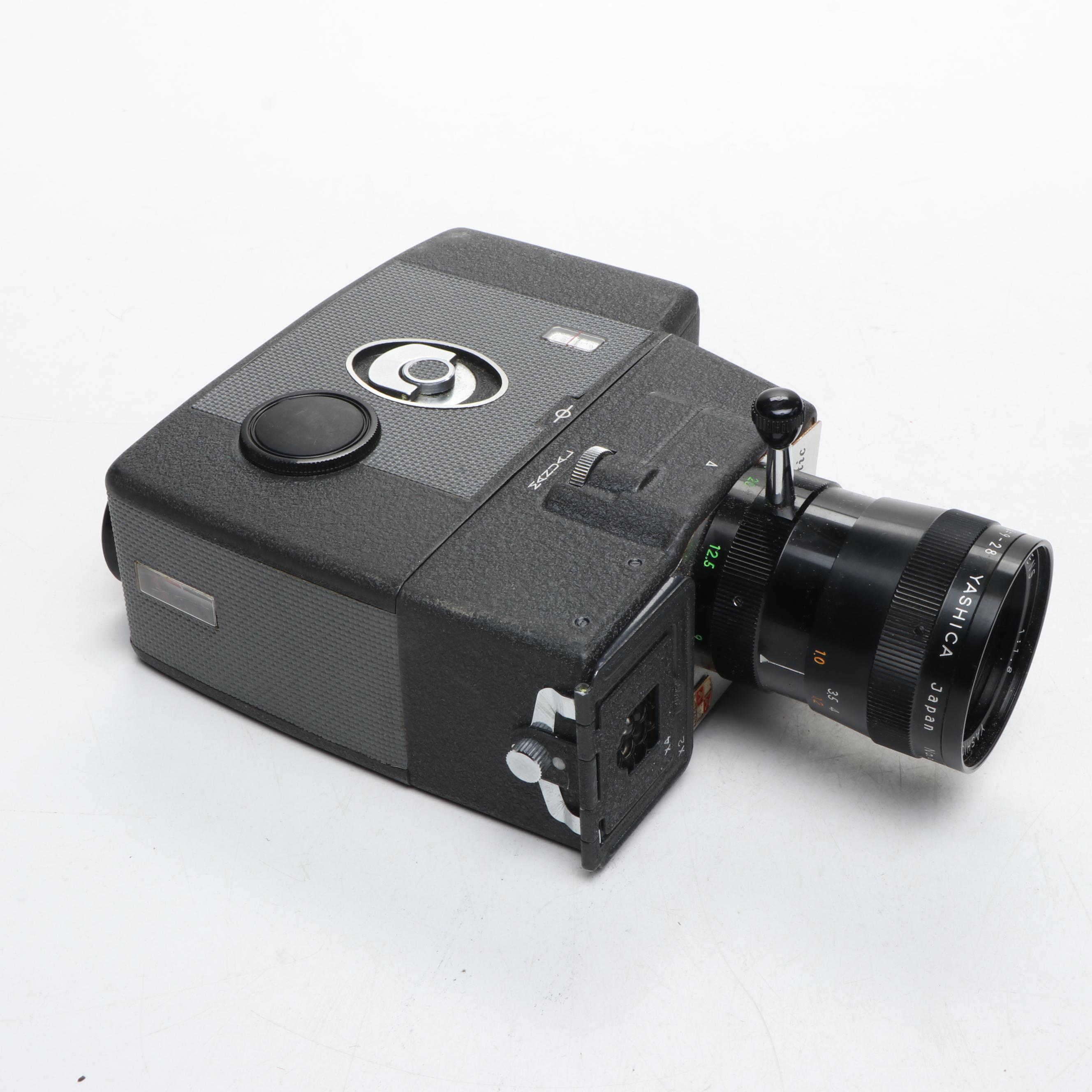 Nikon EL, Yashica-U Matic, and Kodak Retina IIIc Cameras with Lenses