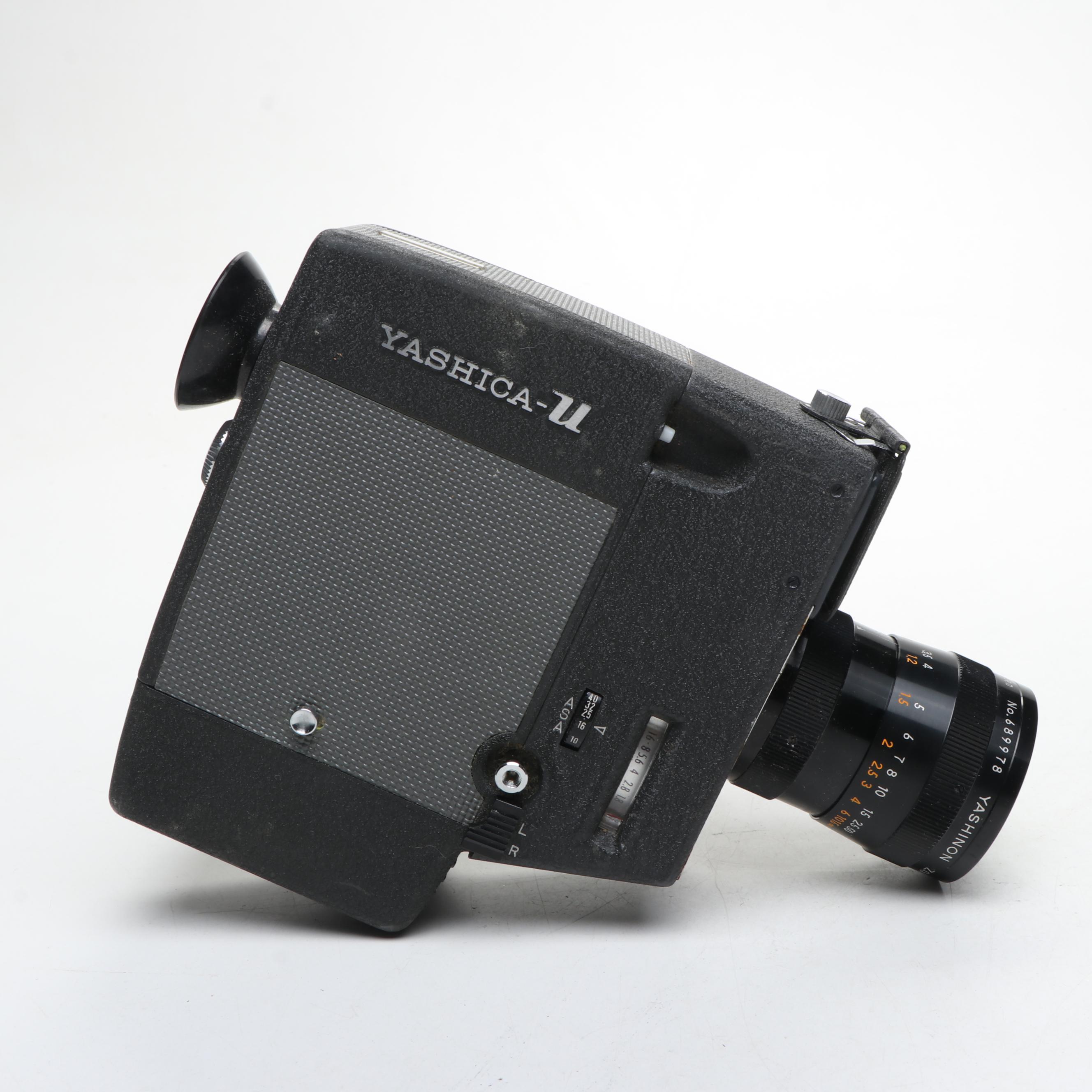 Nikon EL, Yashica-U Matic, and Kodak Retina IIIc Cameras with Lenses