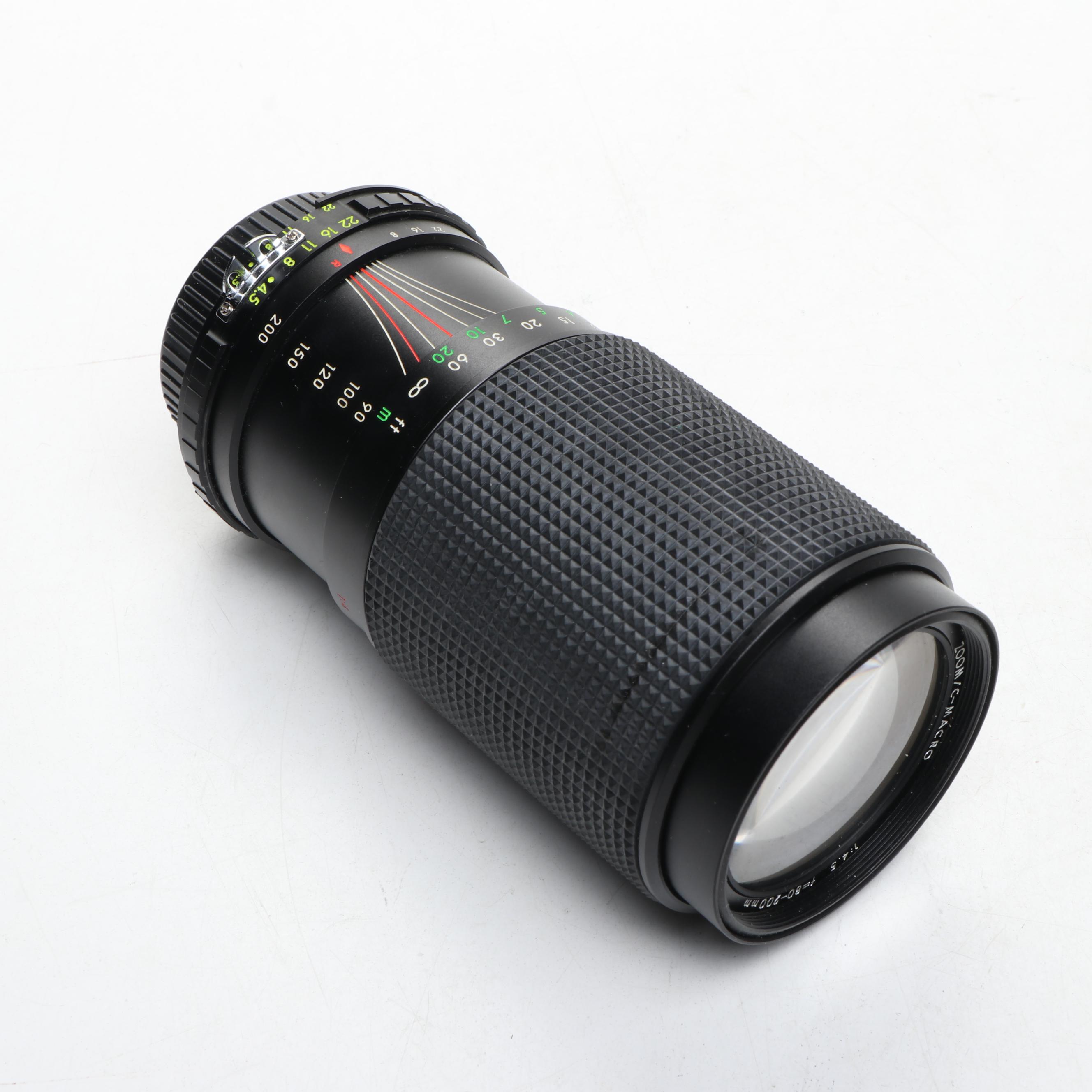 Nikon EL, Yashica-U Matic, and Kodak Retina IIIc Cameras with Lenses