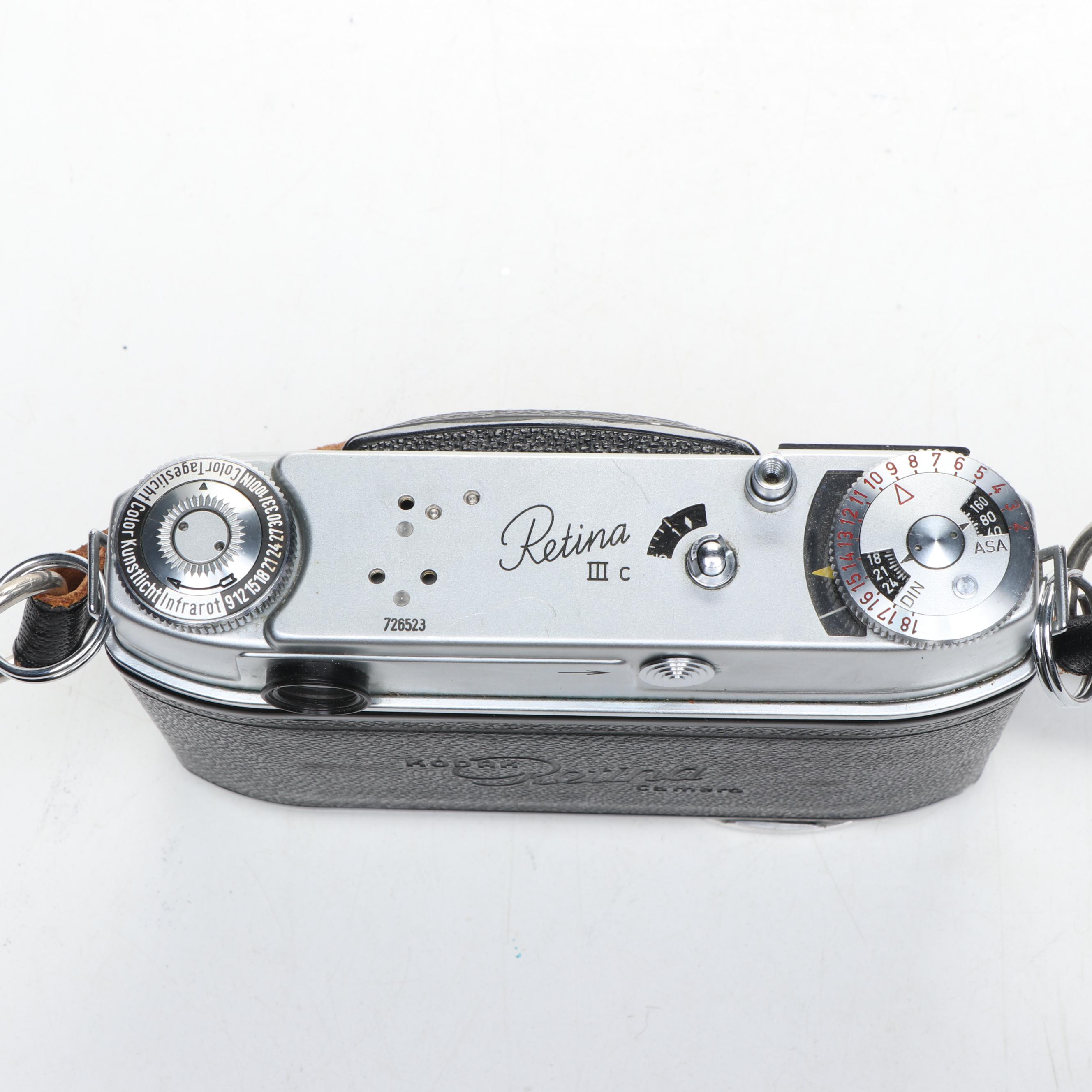 Nikon EL, Yashica-U Matic, and Kodak Retina IIIc Cameras with Lenses