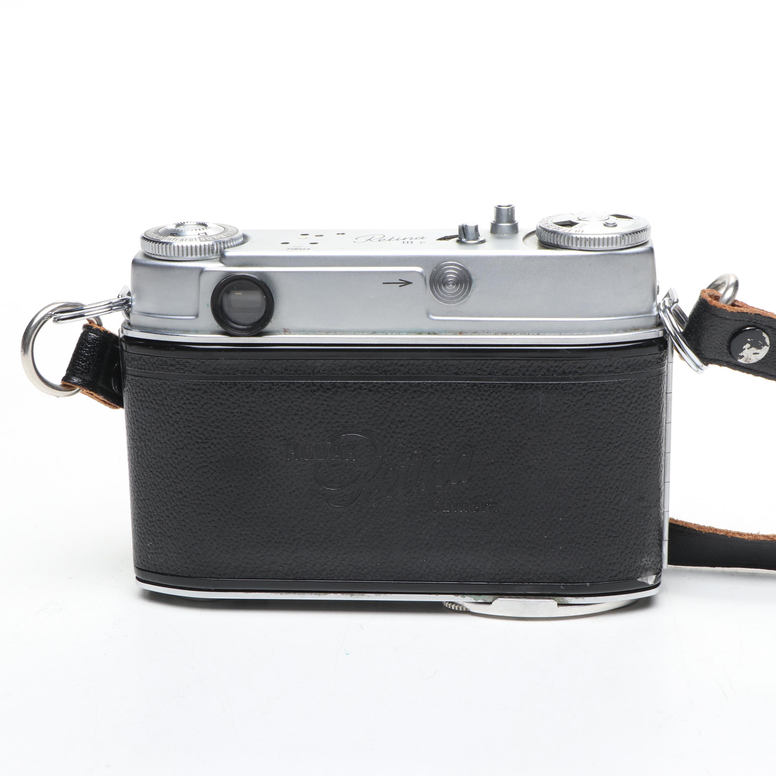 Nikon EL, Yashica-U Matic, and Kodak Retina IIIc Cameras with Lenses