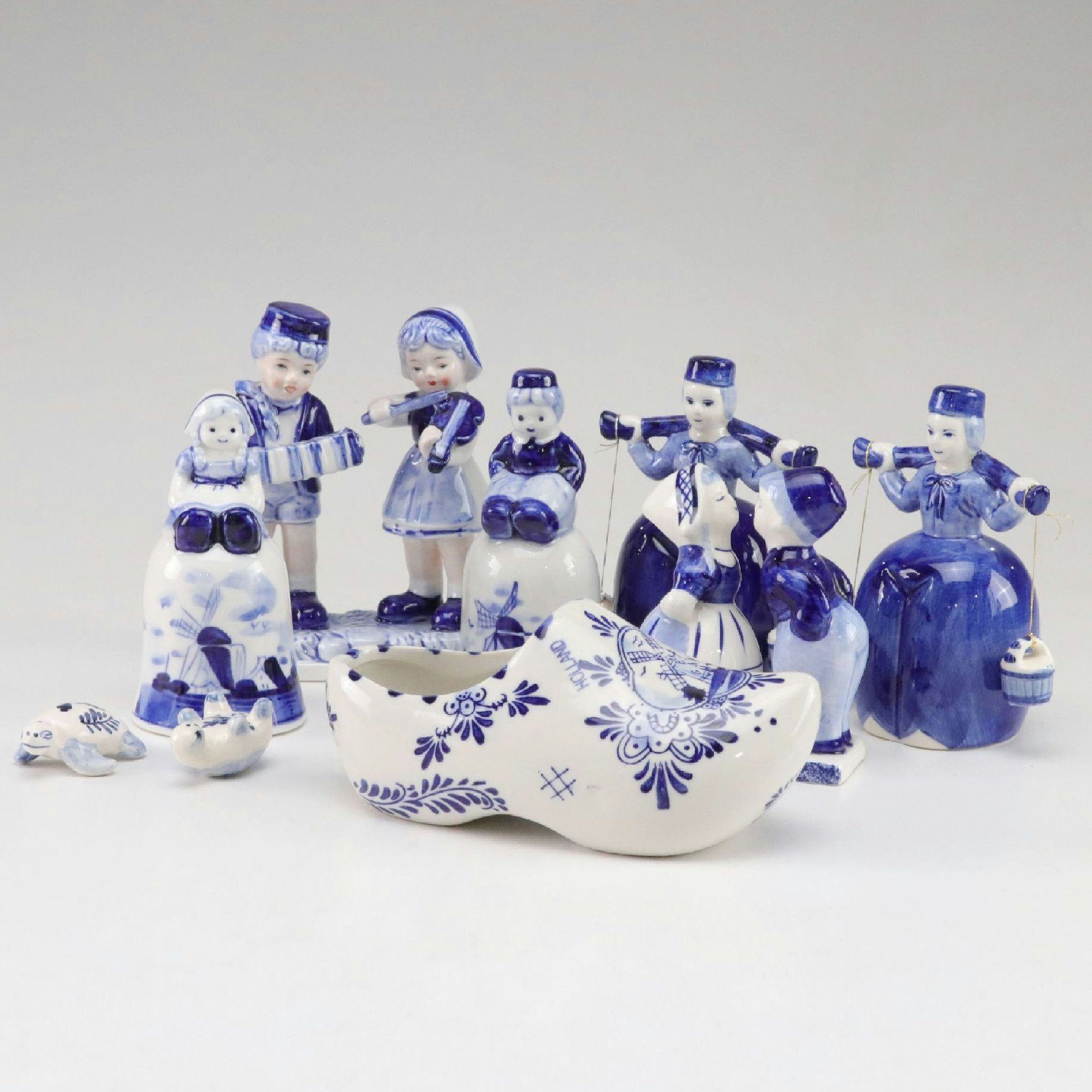 Delft Blue Hand-Painted Milkmaid Bells, Little Musician Figures and More
