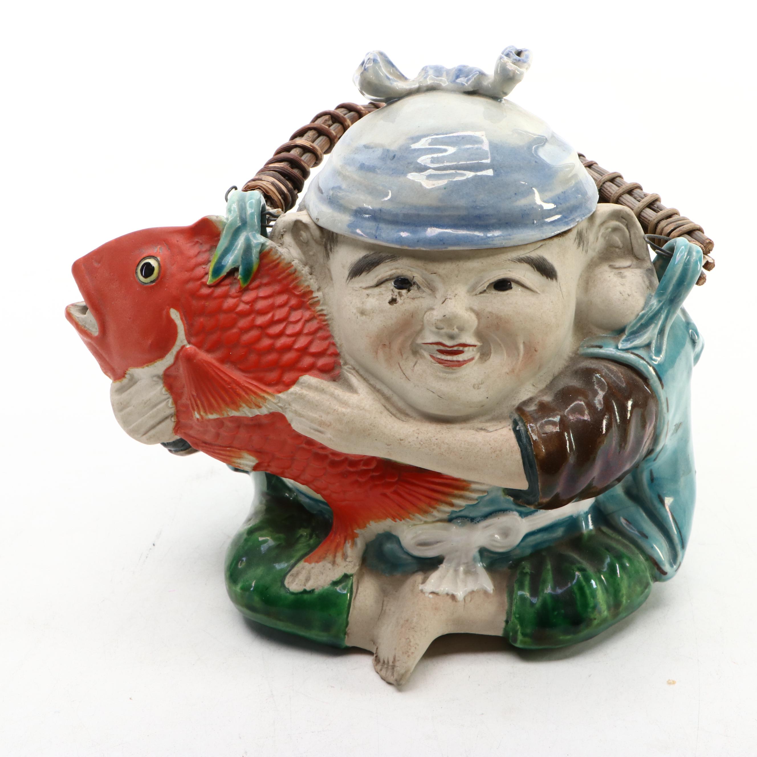 Japanese Banko with English Majolica Figural Teapots and Man in the Moon Jug