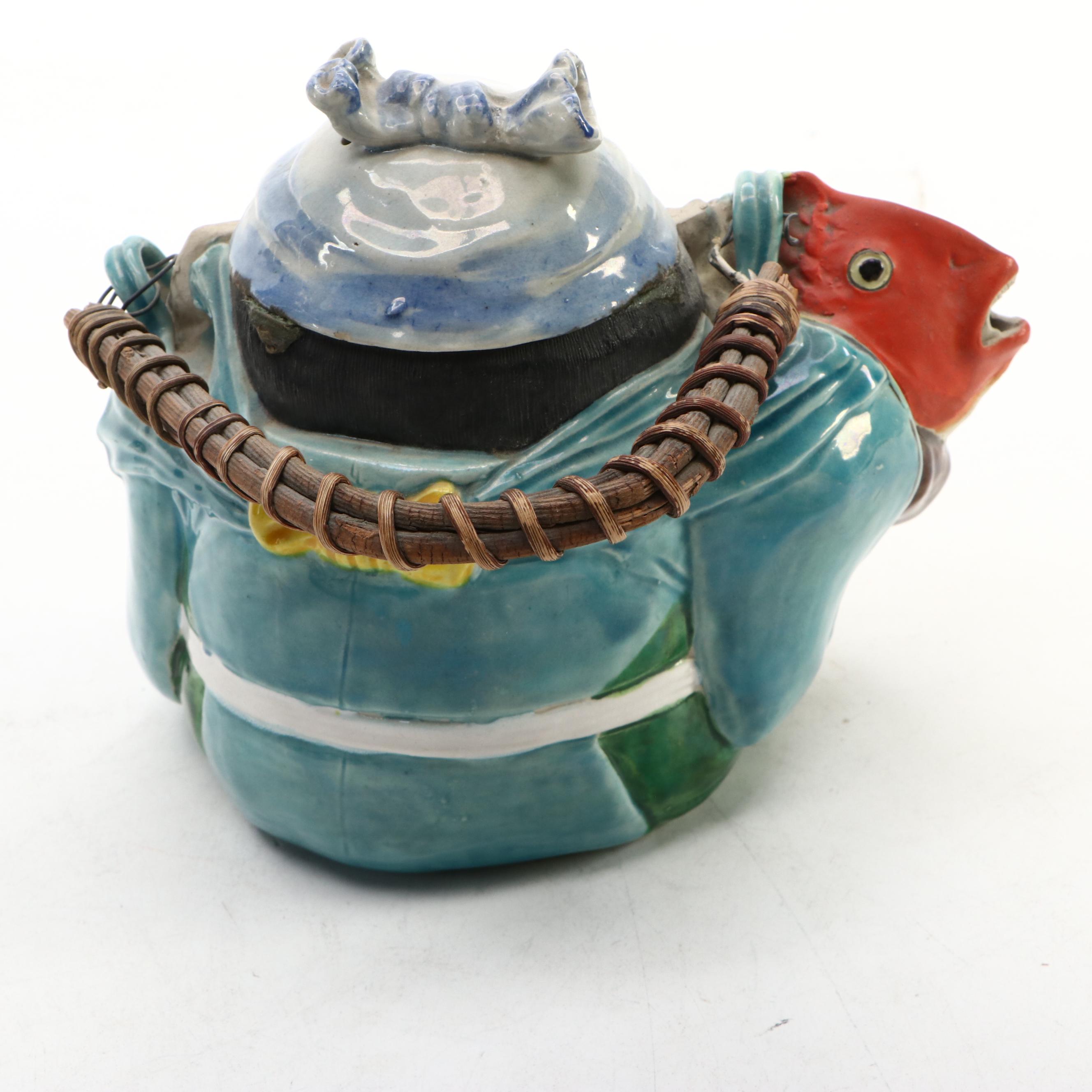 Japanese Banko with English Majolica Figural Teapots and Man in the Moon Jug