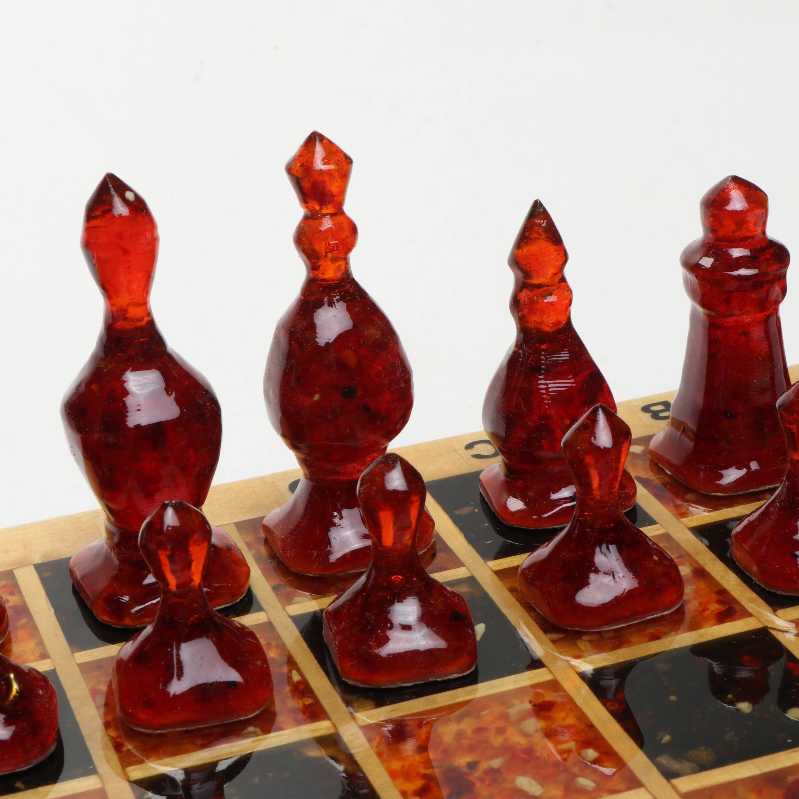 Wooden Chess Board with Black and Amber Resin Pieces